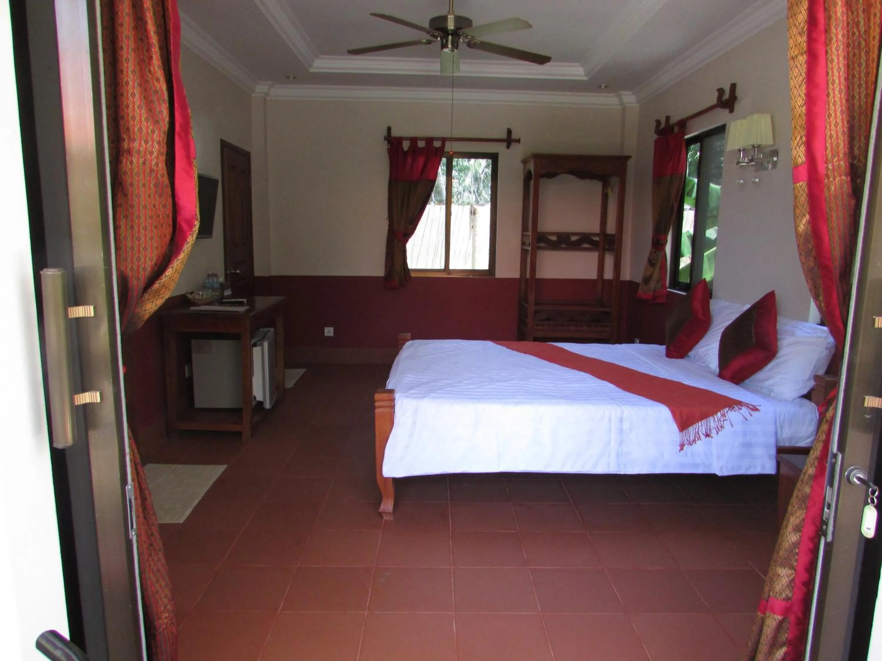 Bed in Phoumrumduol Bungalow