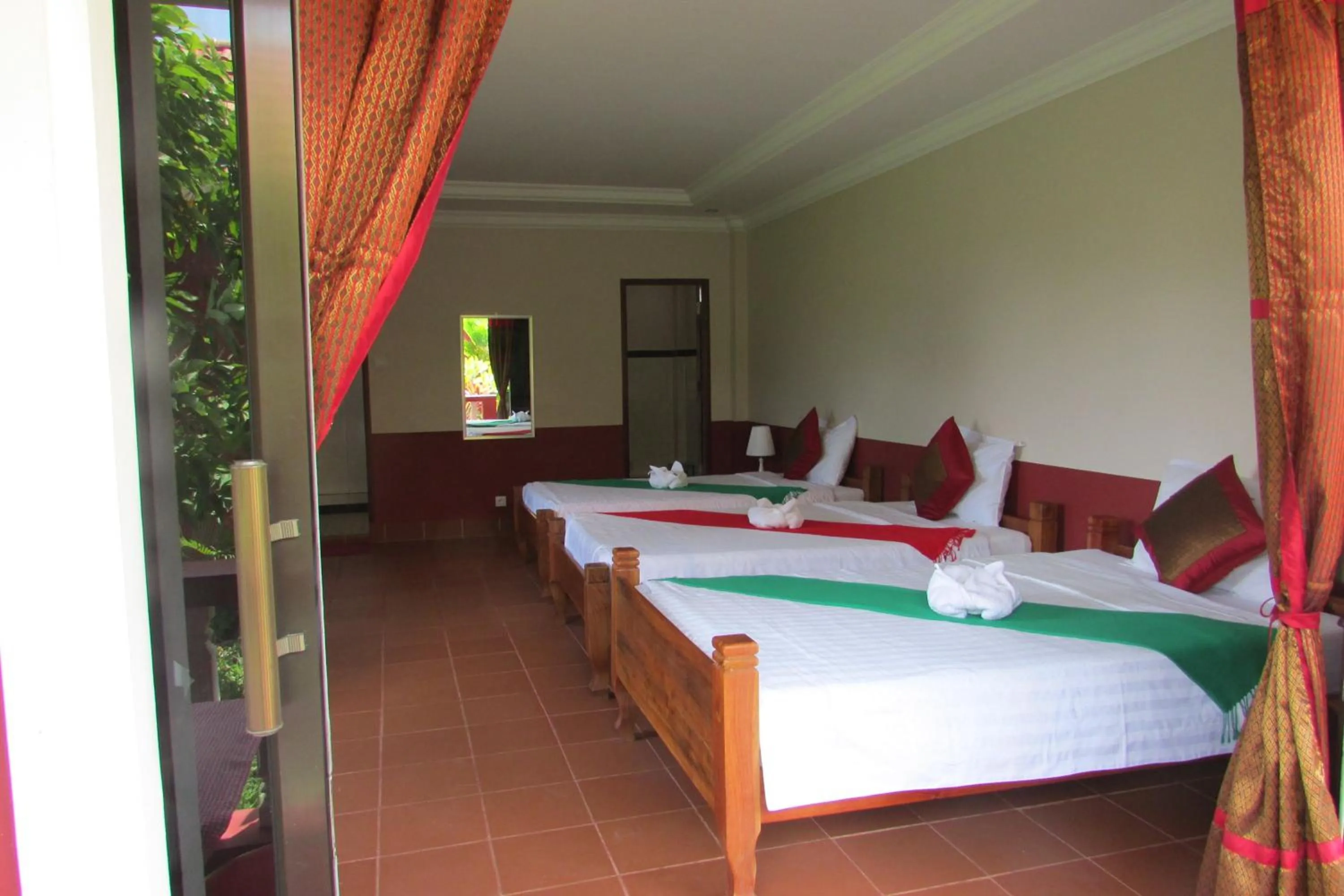 Bed in Phoumrumduol Bungalow