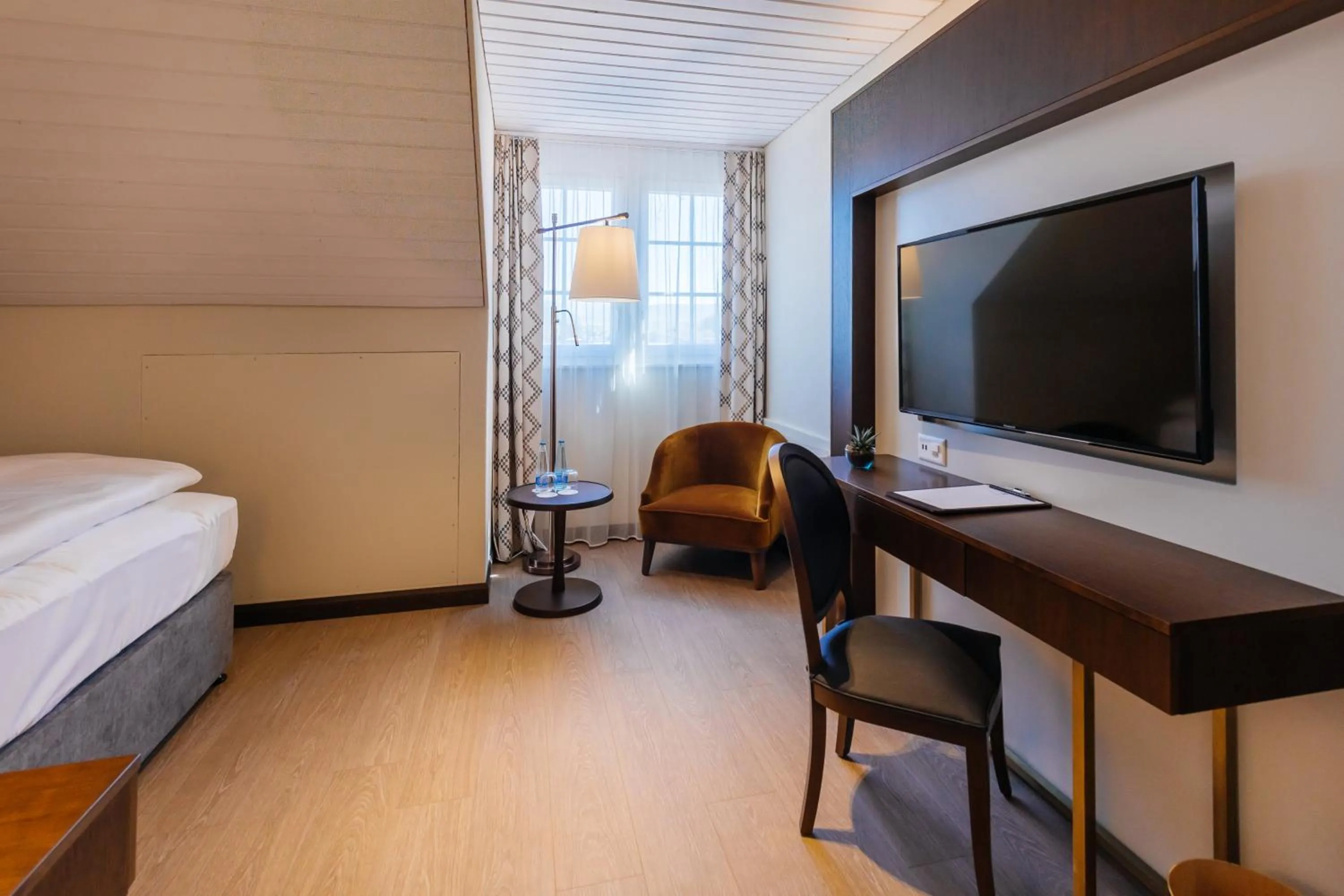 Bed in Hotel Taverna