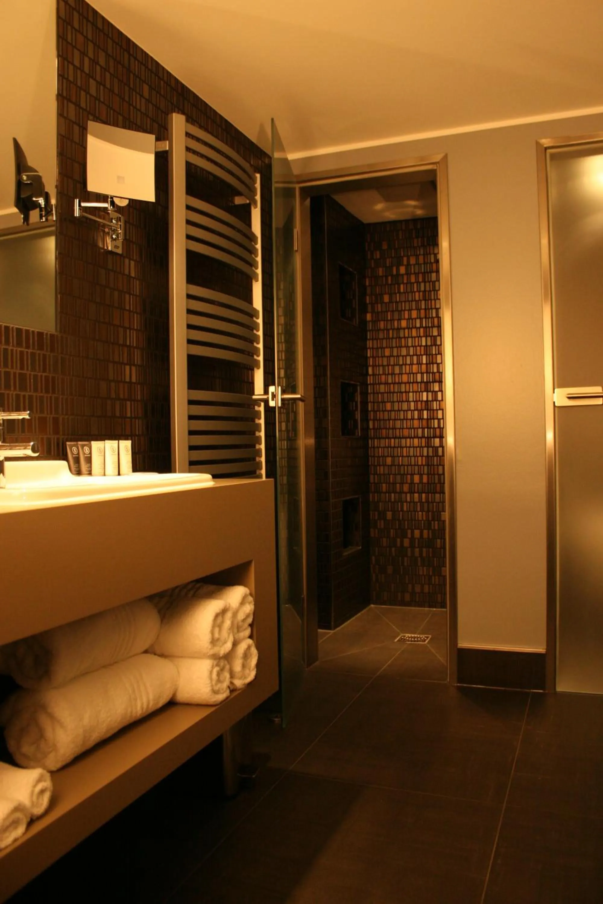 Bathroom, Bed in Hotel Rosenmeer