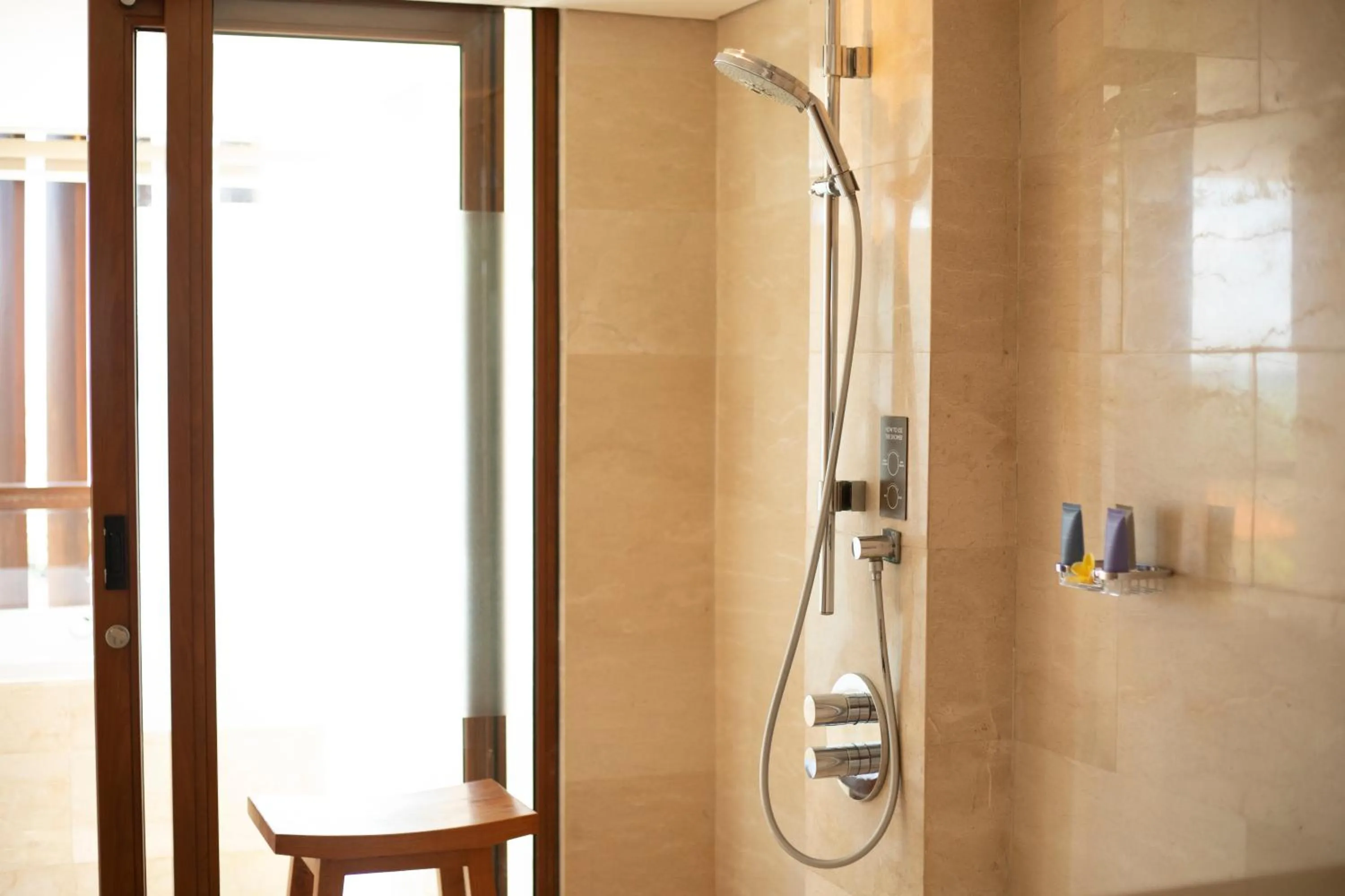 Shower in The Bandha Hotel & Suites