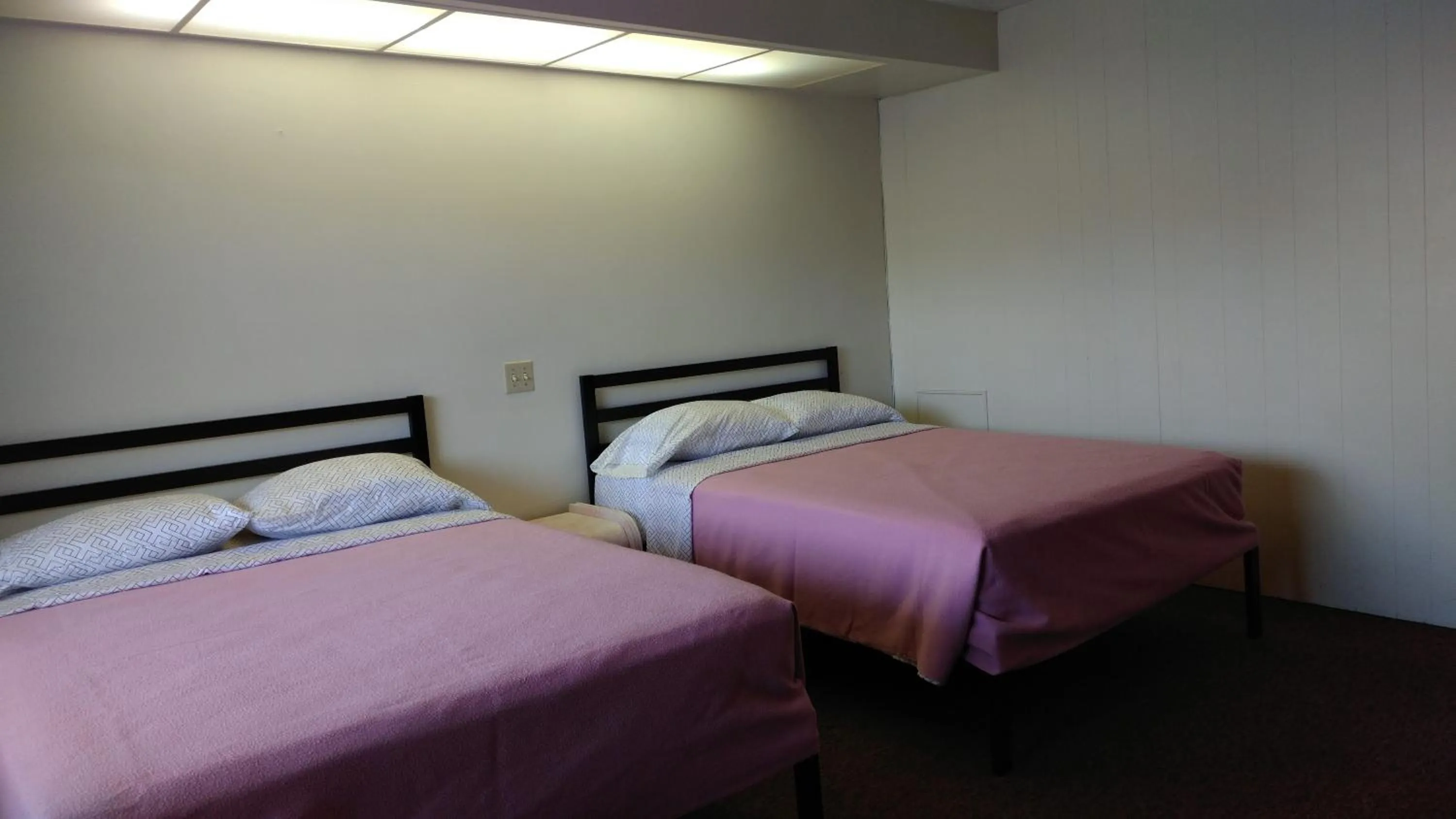 Bed in Driftwood Motel