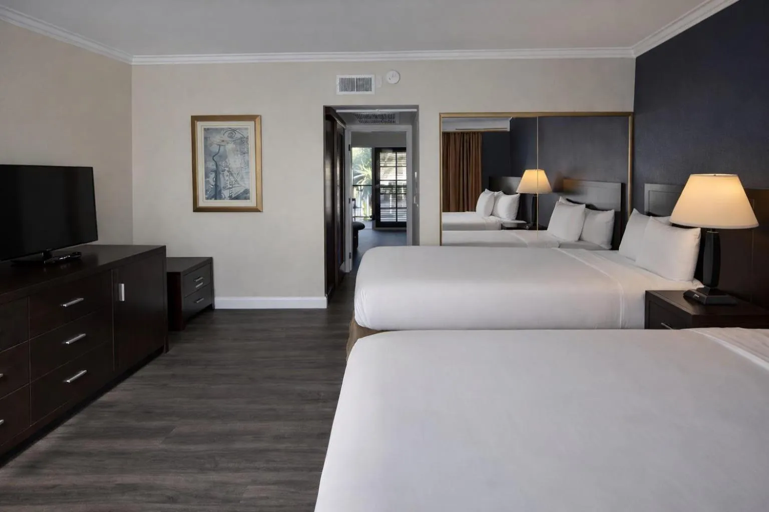 Bed in The Buena Park Grand Hotel & Suites