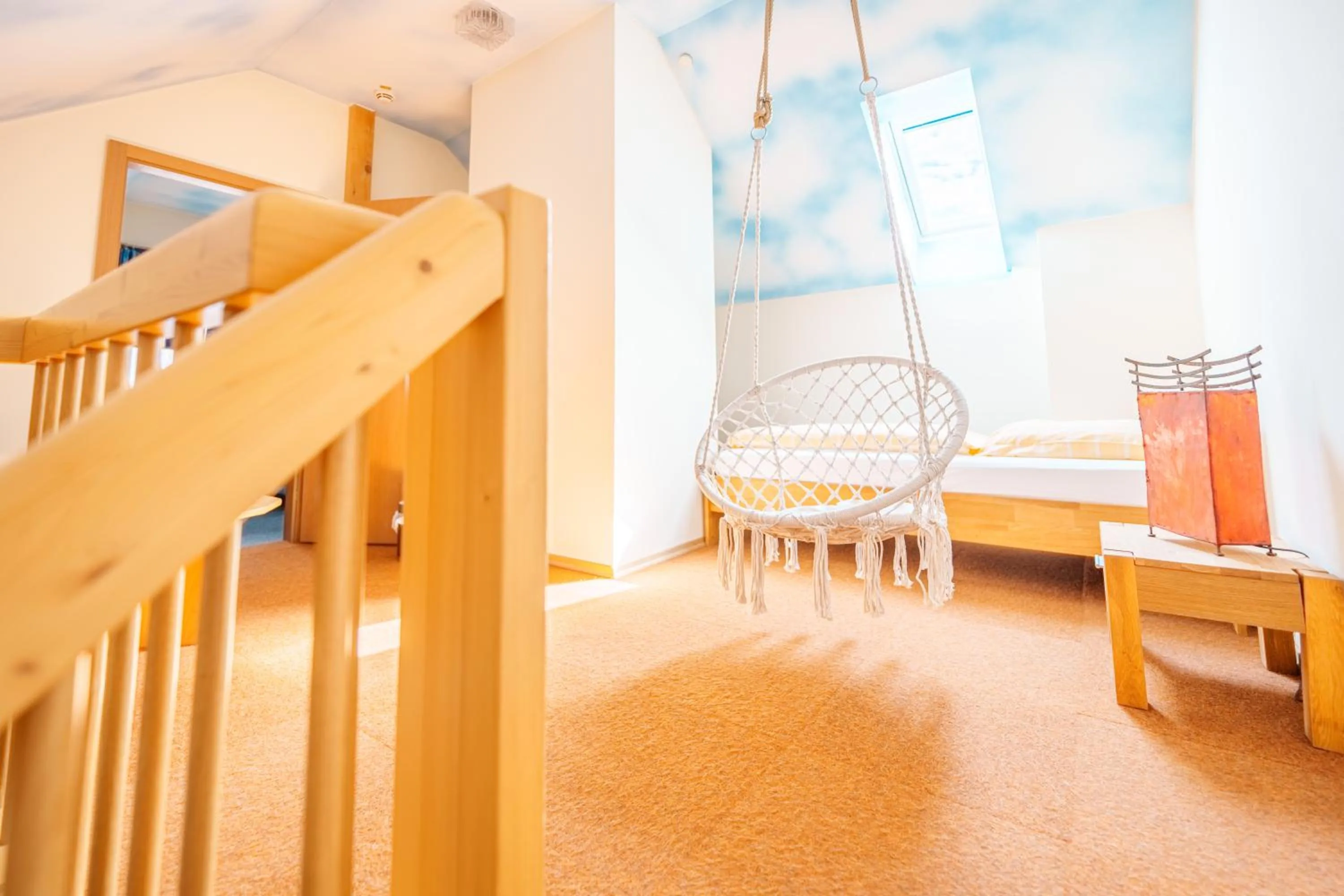 Living room, Bed in König Ludwig Design Hotel NEU Zimmer mit Sauna oder Whirlpool oder mehr