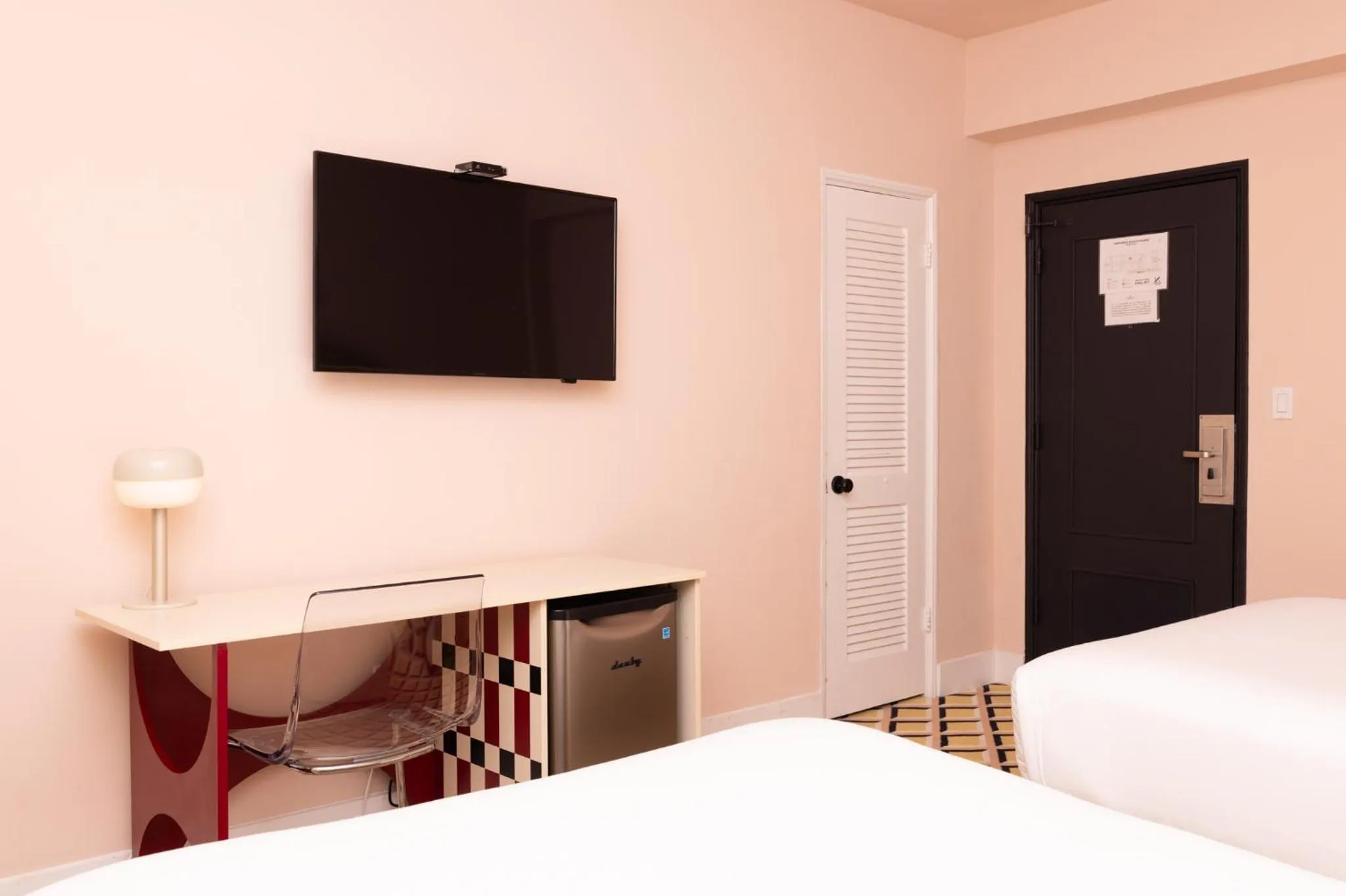 Bed in Crest Hotel Suites