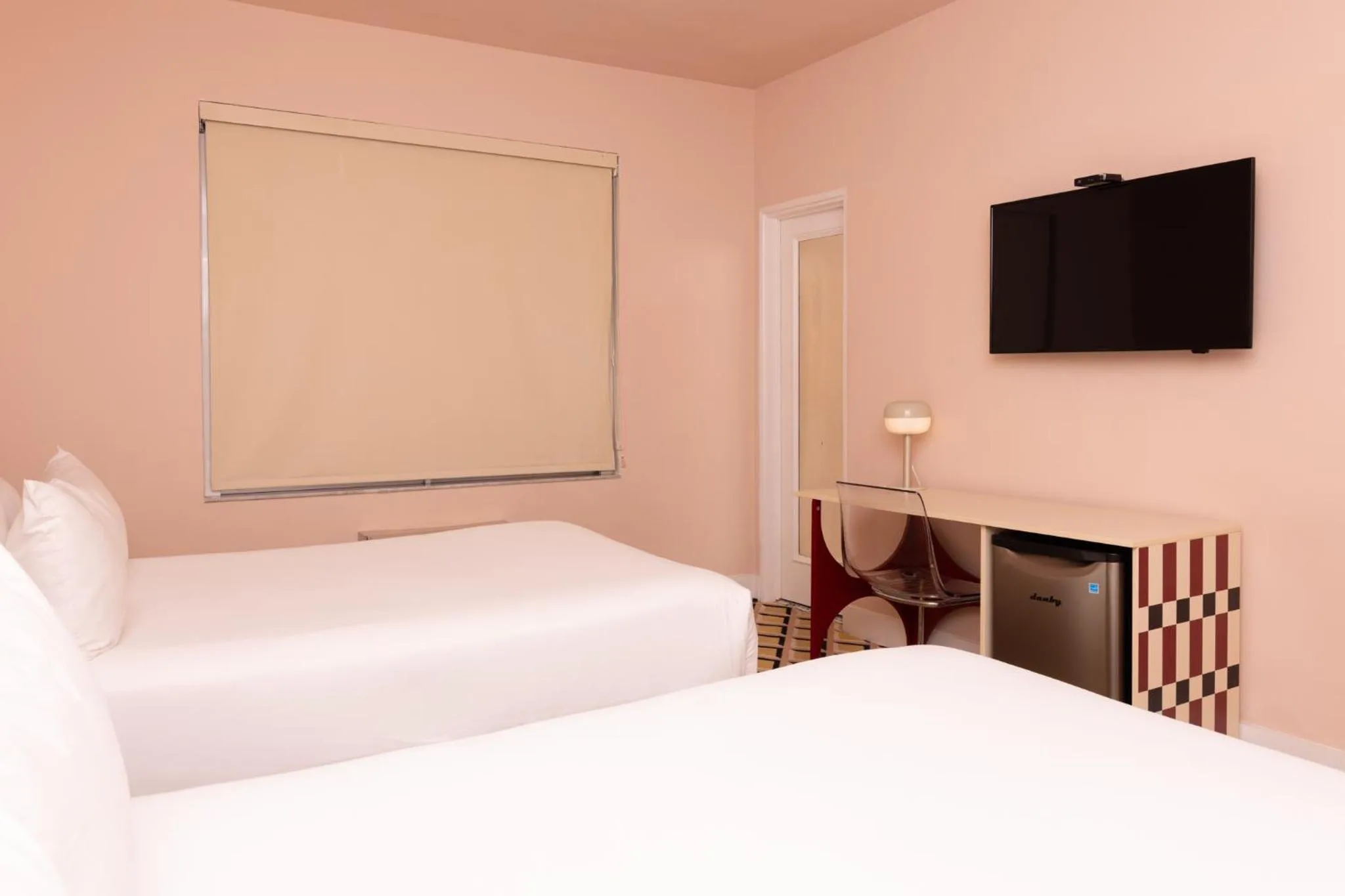 Bed in Crest Hotel Suites