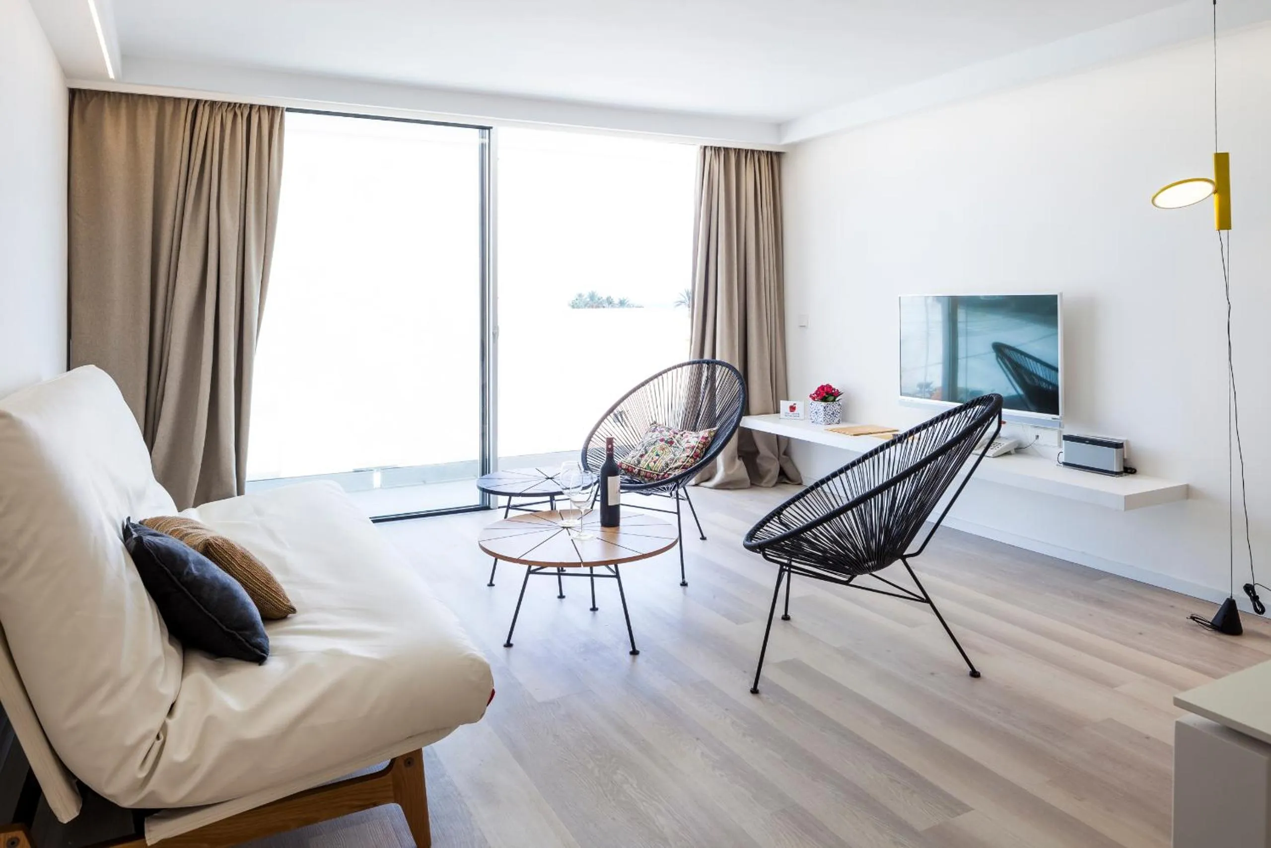 Living room in Sud Ibiza Suites