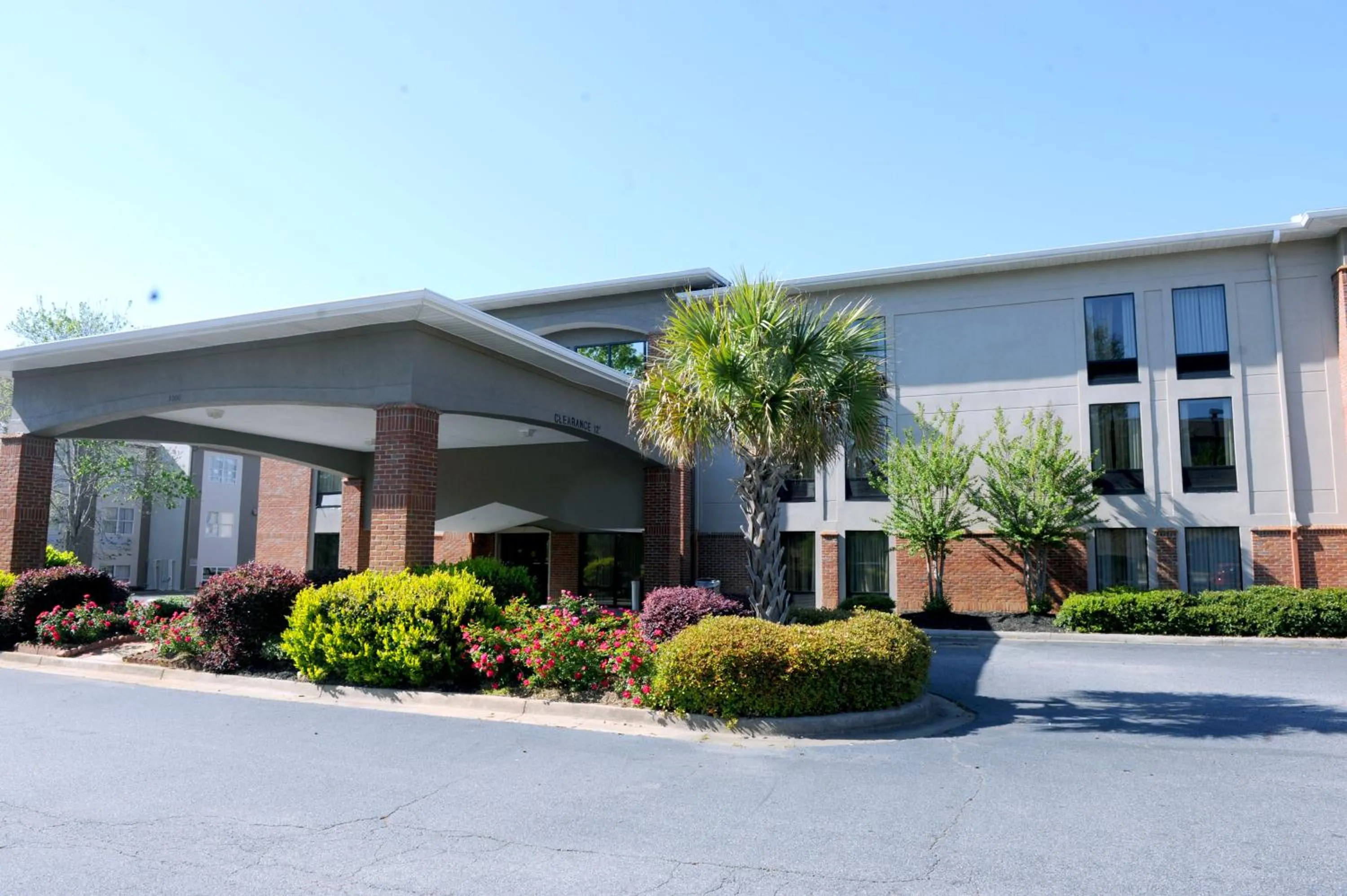 Property building in Country Inn & Suites by Radisson, Alpharetta, GA