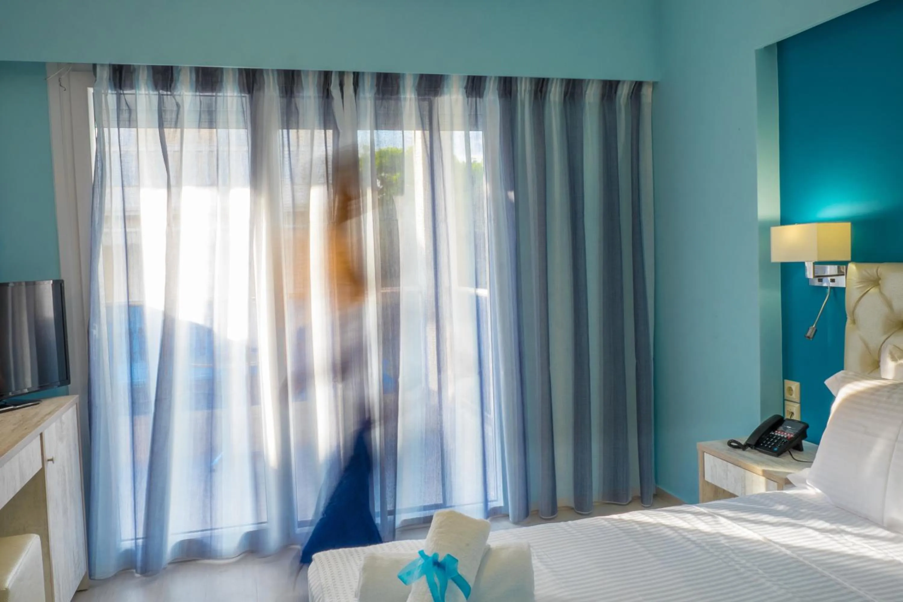 Bed in Must Boutique Hotel & Restaurant