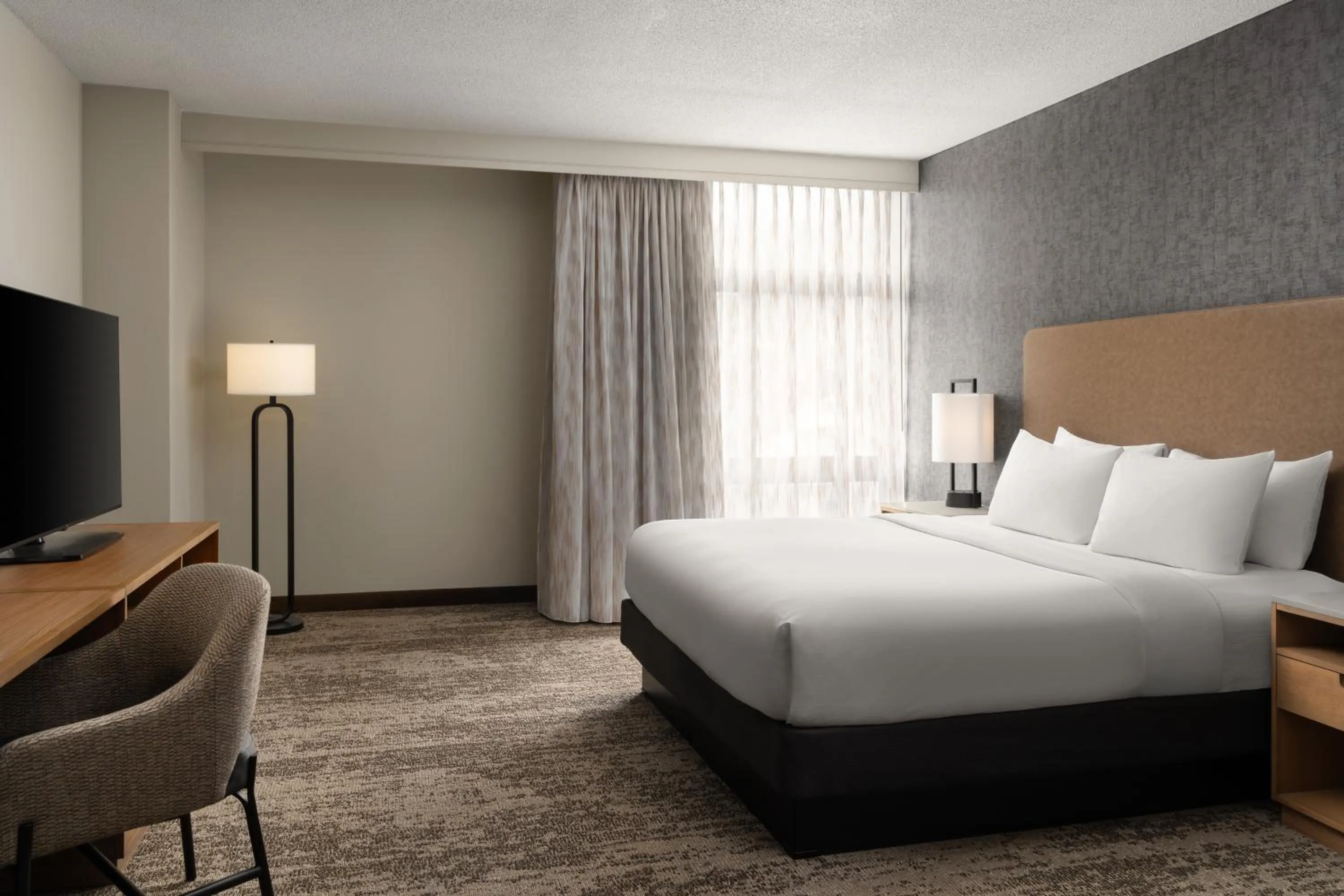 Bed in Embassy Suites by Hilton at Hot Springs Convention Center