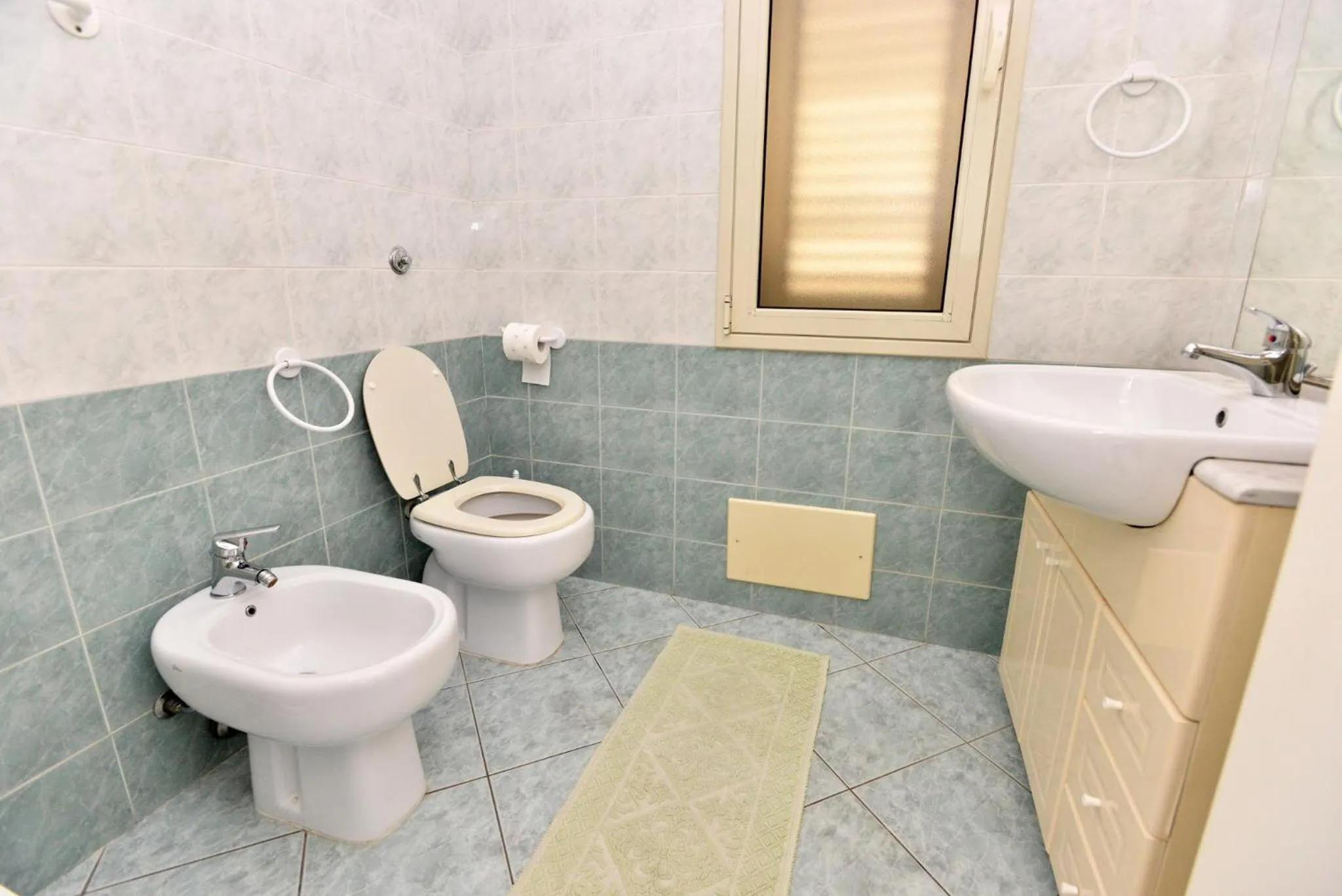 Toilet in IzzHome Regina Margherita