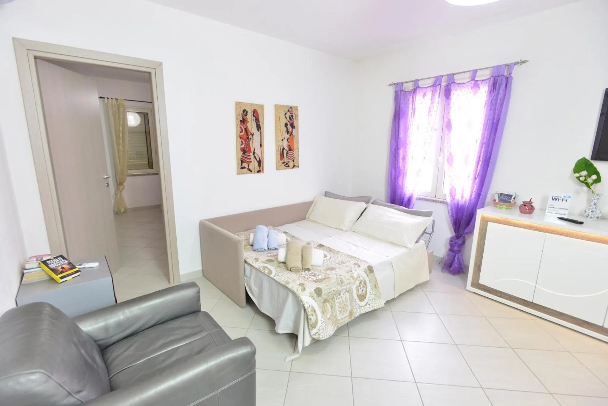 Living room in IzzHome Regina Margherita