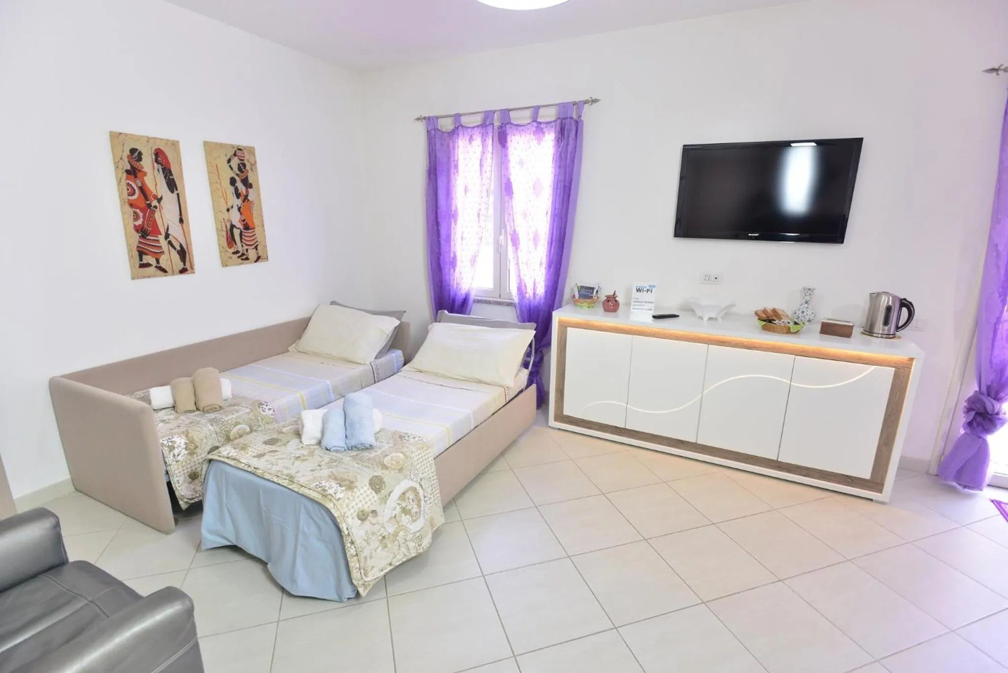 TV and multimedia, Bed in IzzHome Regina Margherita