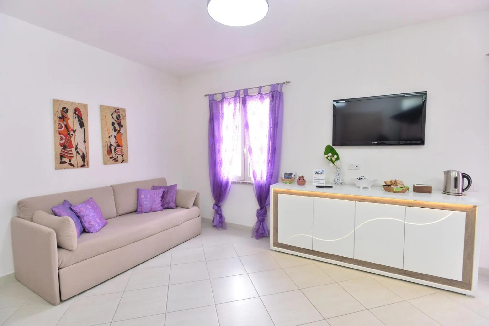 Seating area in IzzHome Regina Margherita