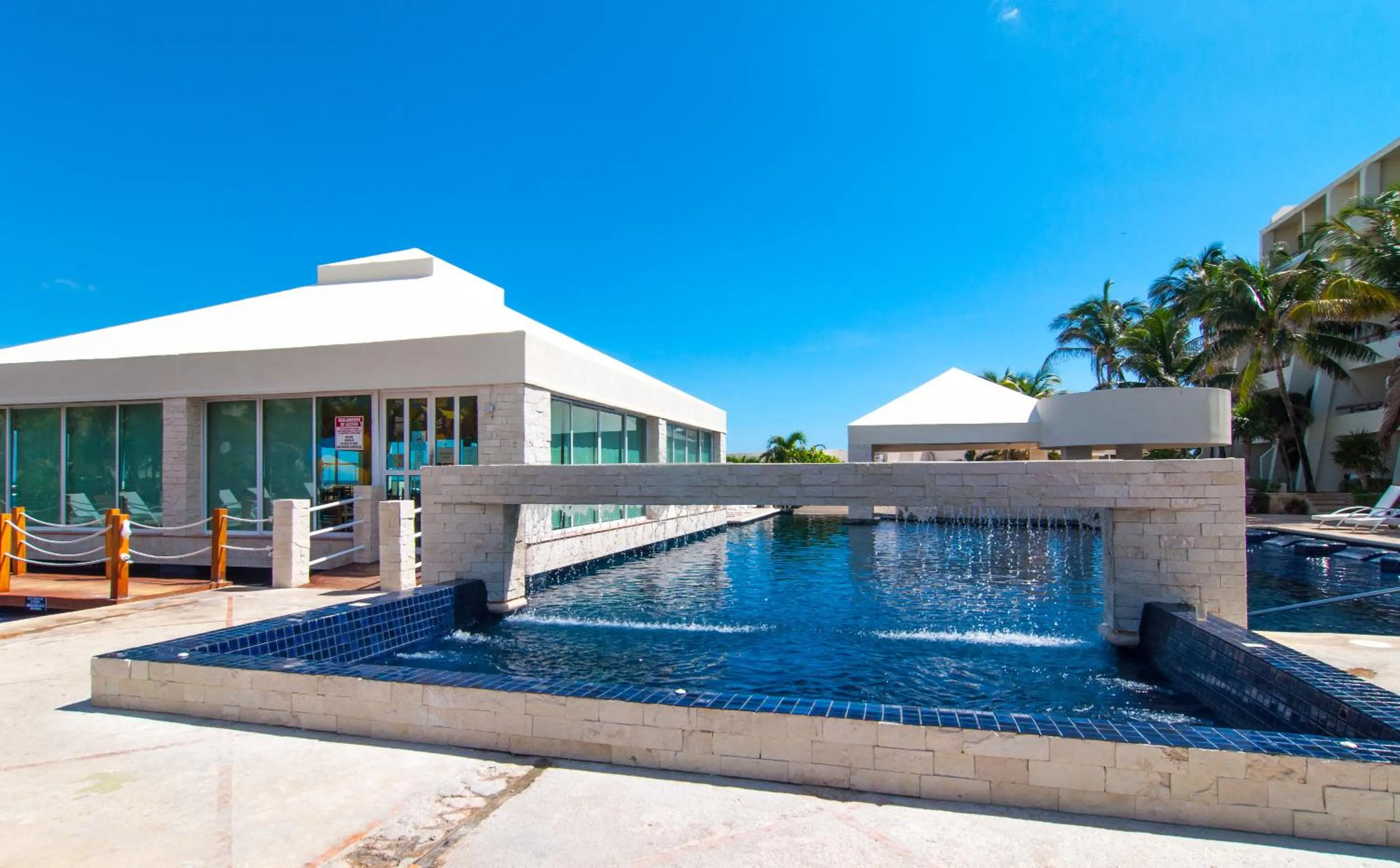 Swimming pool in Solymar Condo Beach Resort by Casago