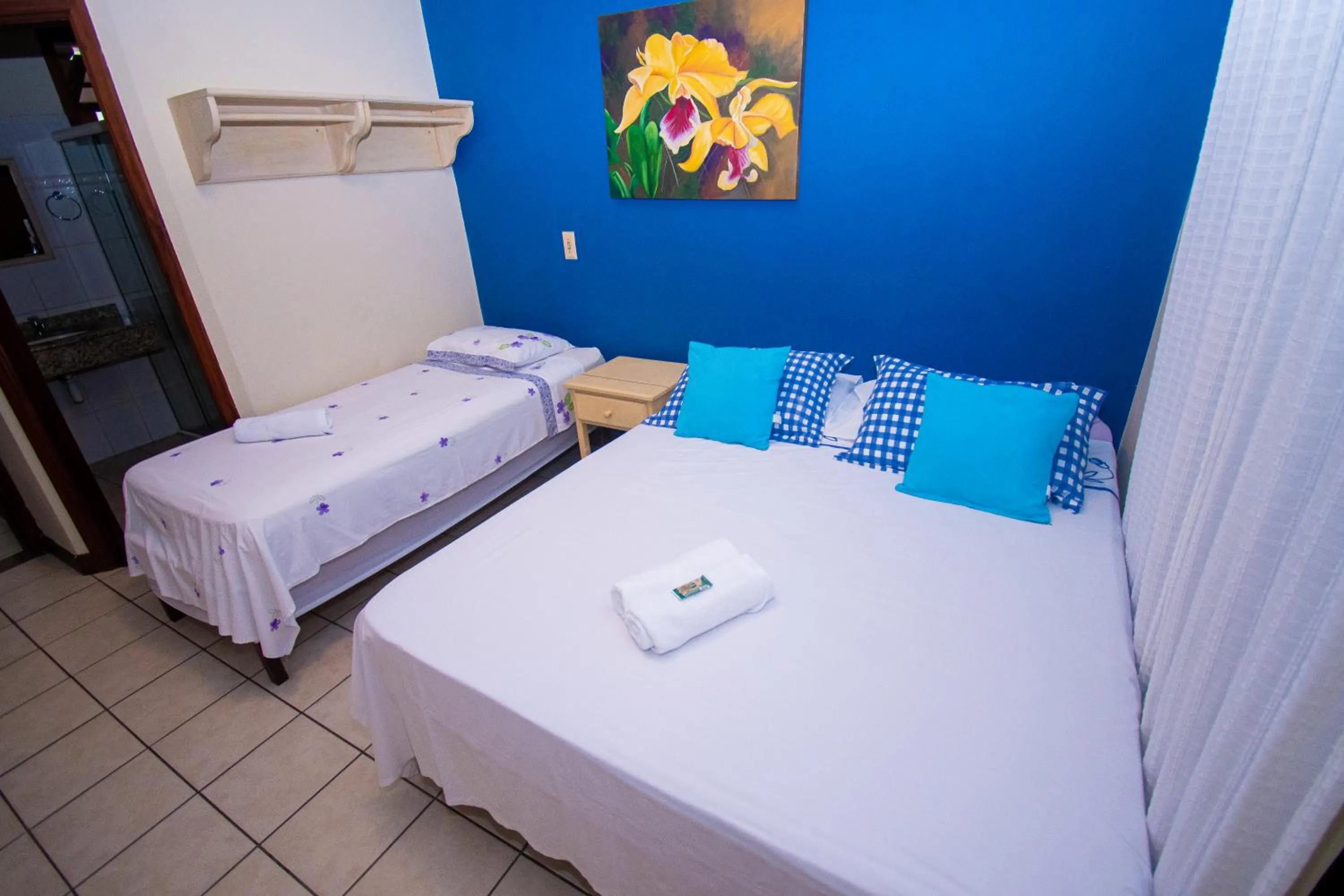 Bed in Pousada Brisa de Paraty