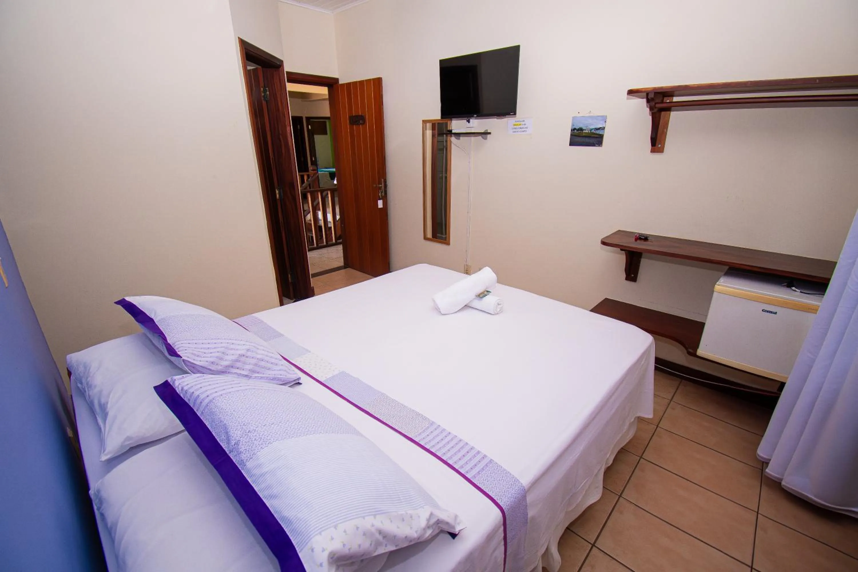 Bed in Pousada Brisa de Paraty