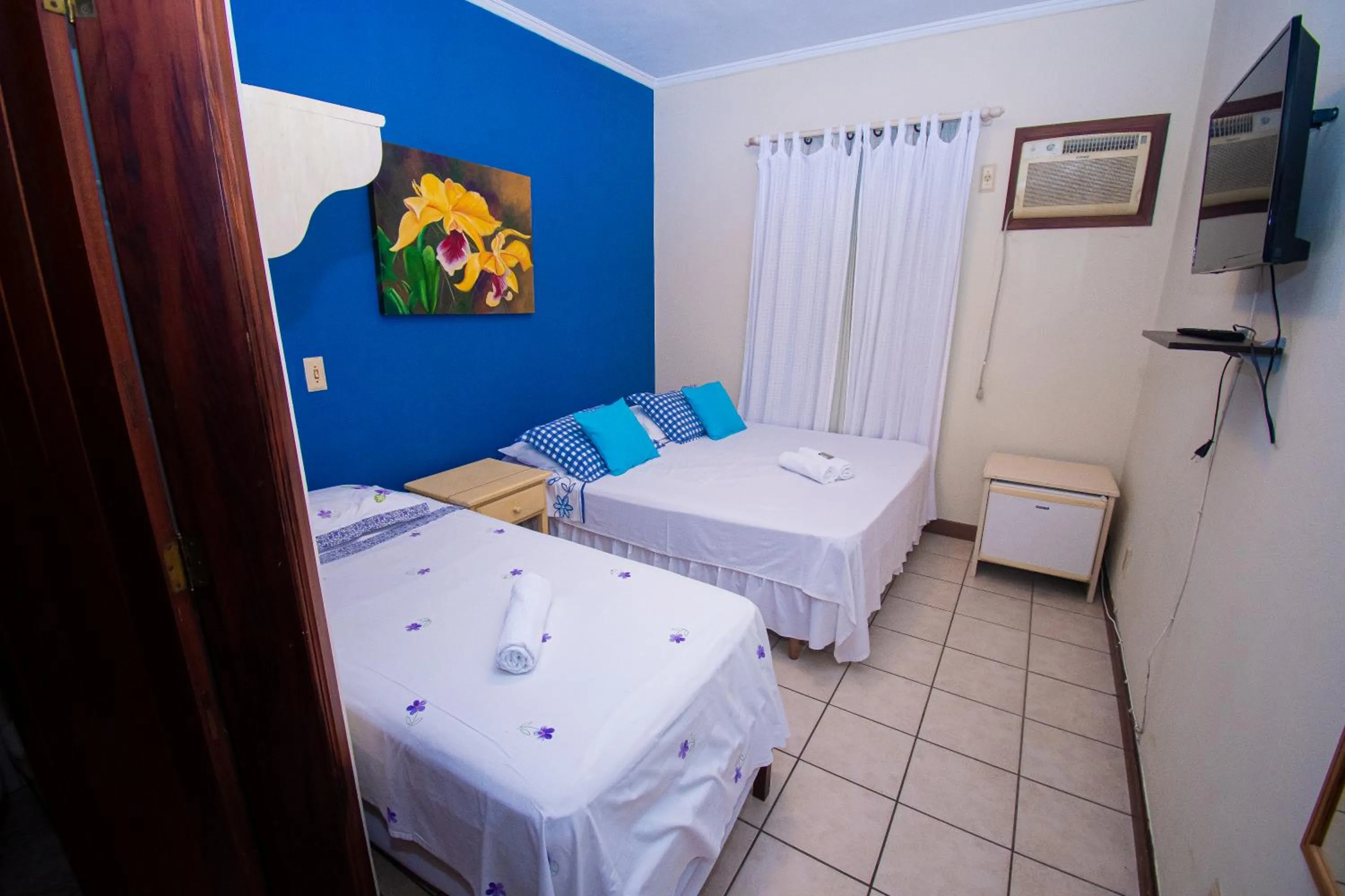 Bed in Pousada Brisa de Paraty