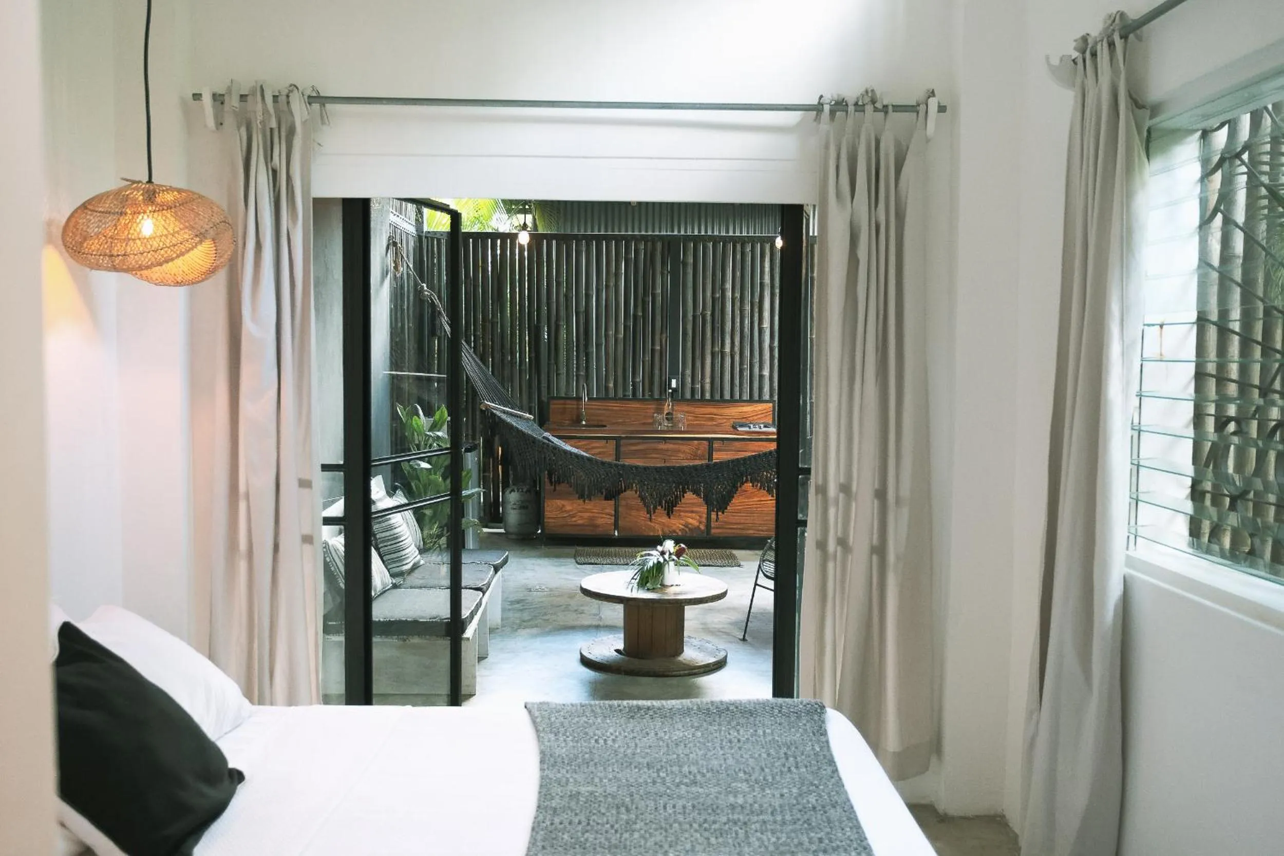 Seating area, Bed in La Negra Surf Hotel
