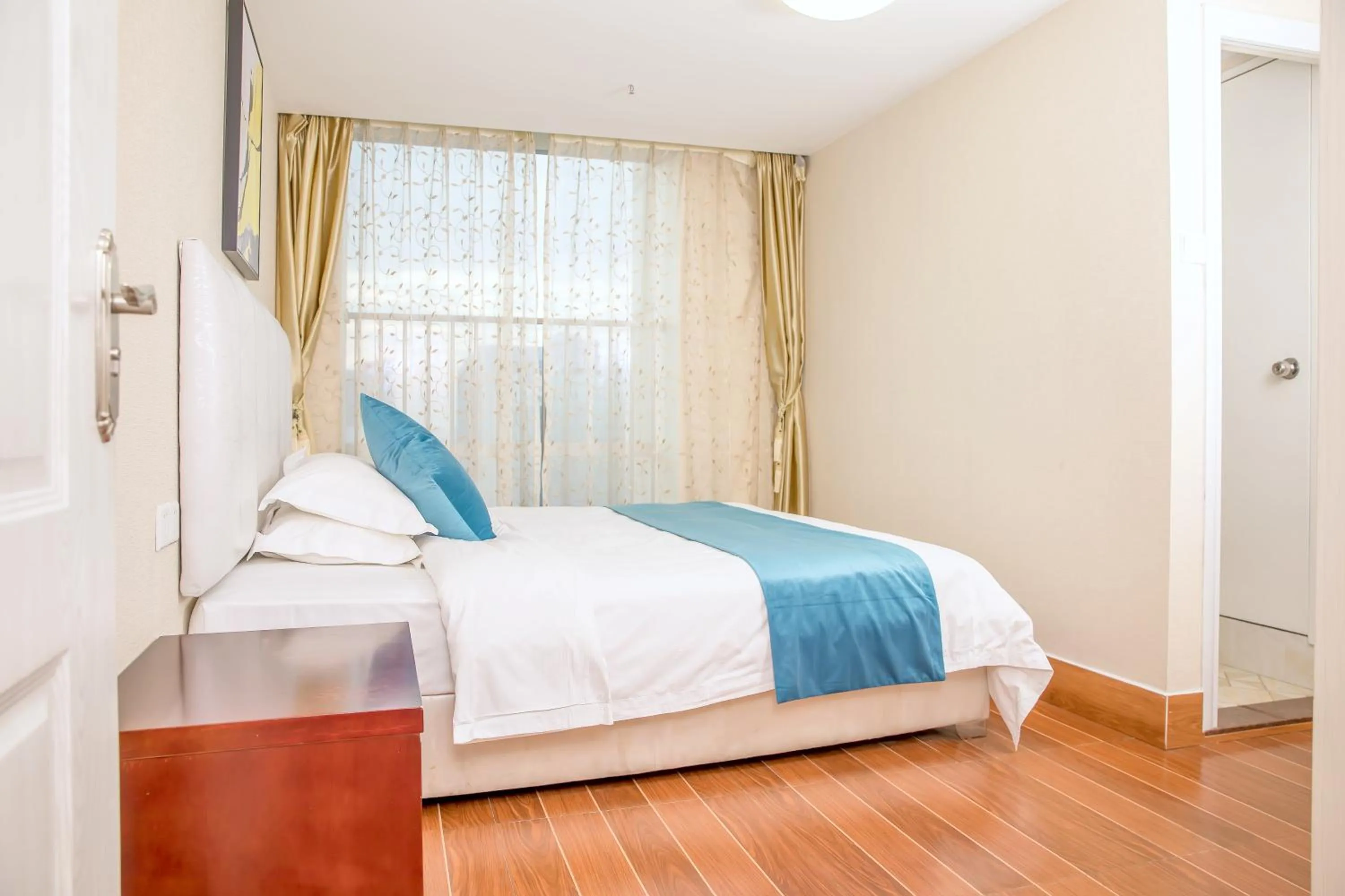 Photo of the whole room, Bed in Guangzhou Boman Apartment Zhengjia Huanshi Branch