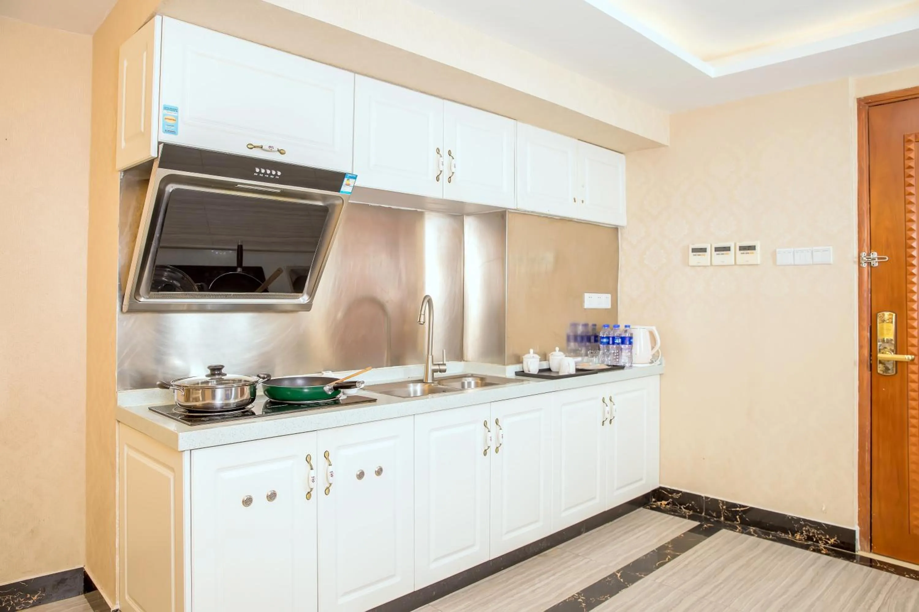 Kitchen or kitchenette in Guangzhou Boman Apartment Zhengjia Huanshi Branch