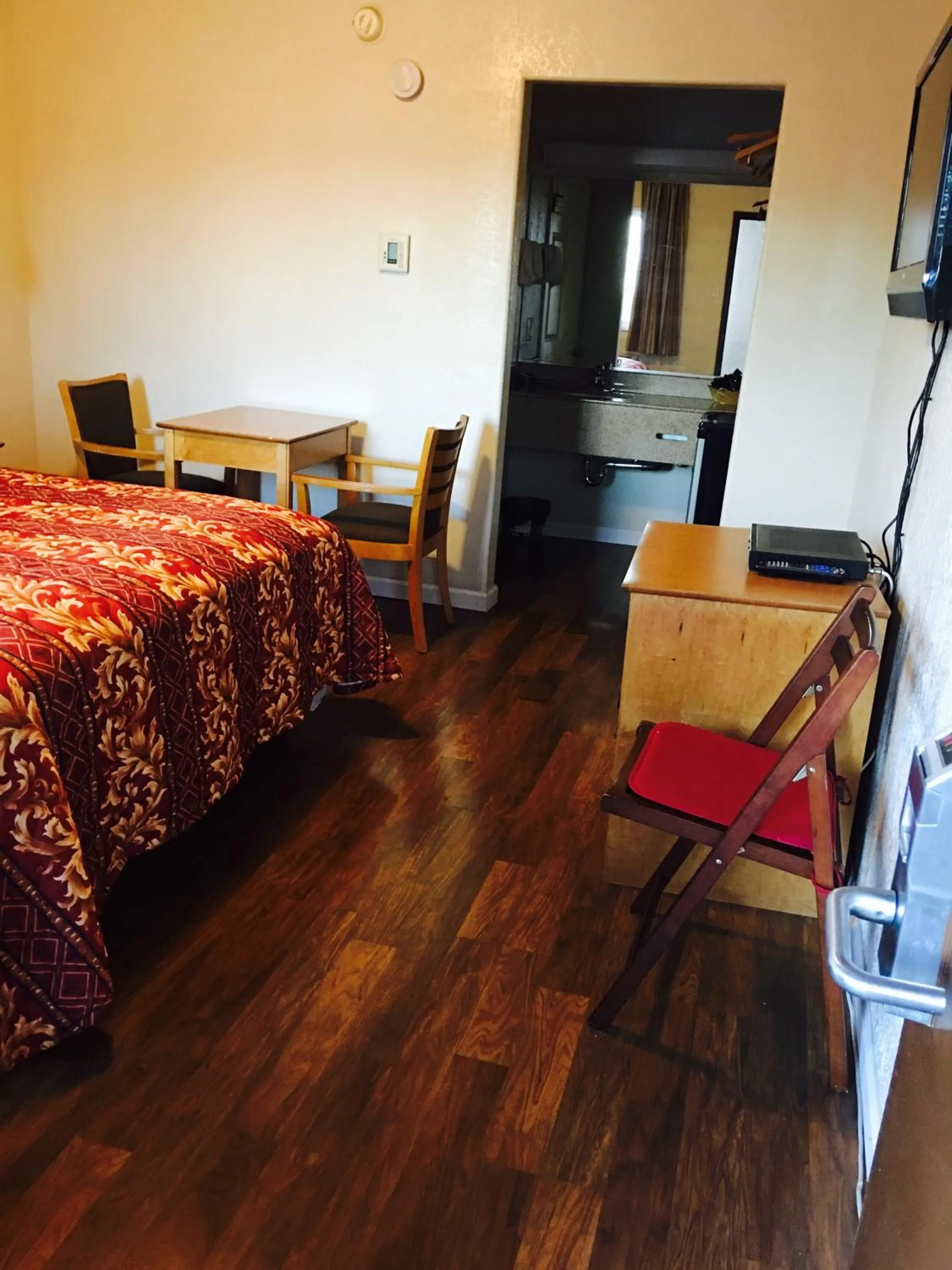 Decorative detail, Bed in Economy Inn