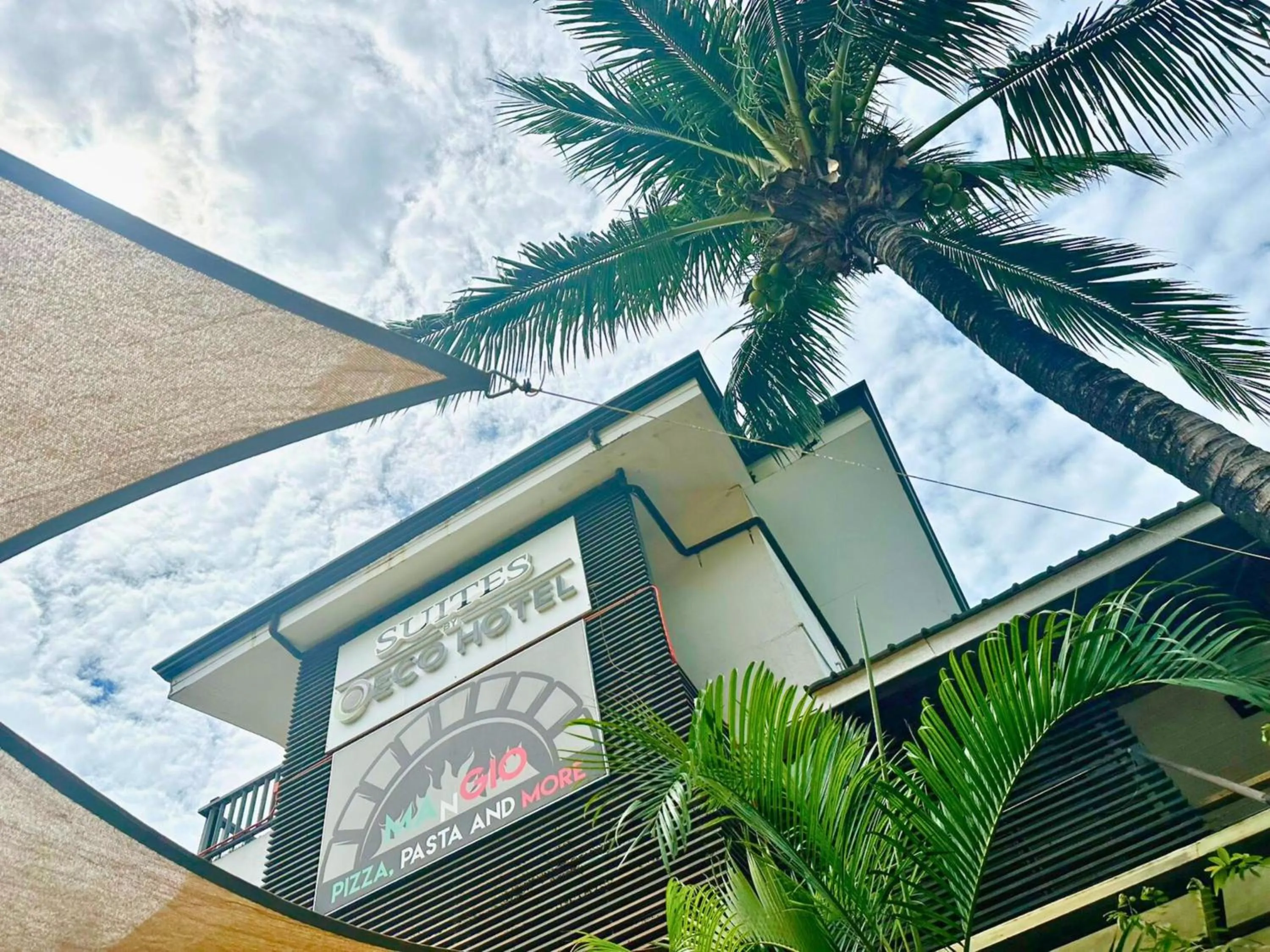 Property building in Suites by Eco Hotels