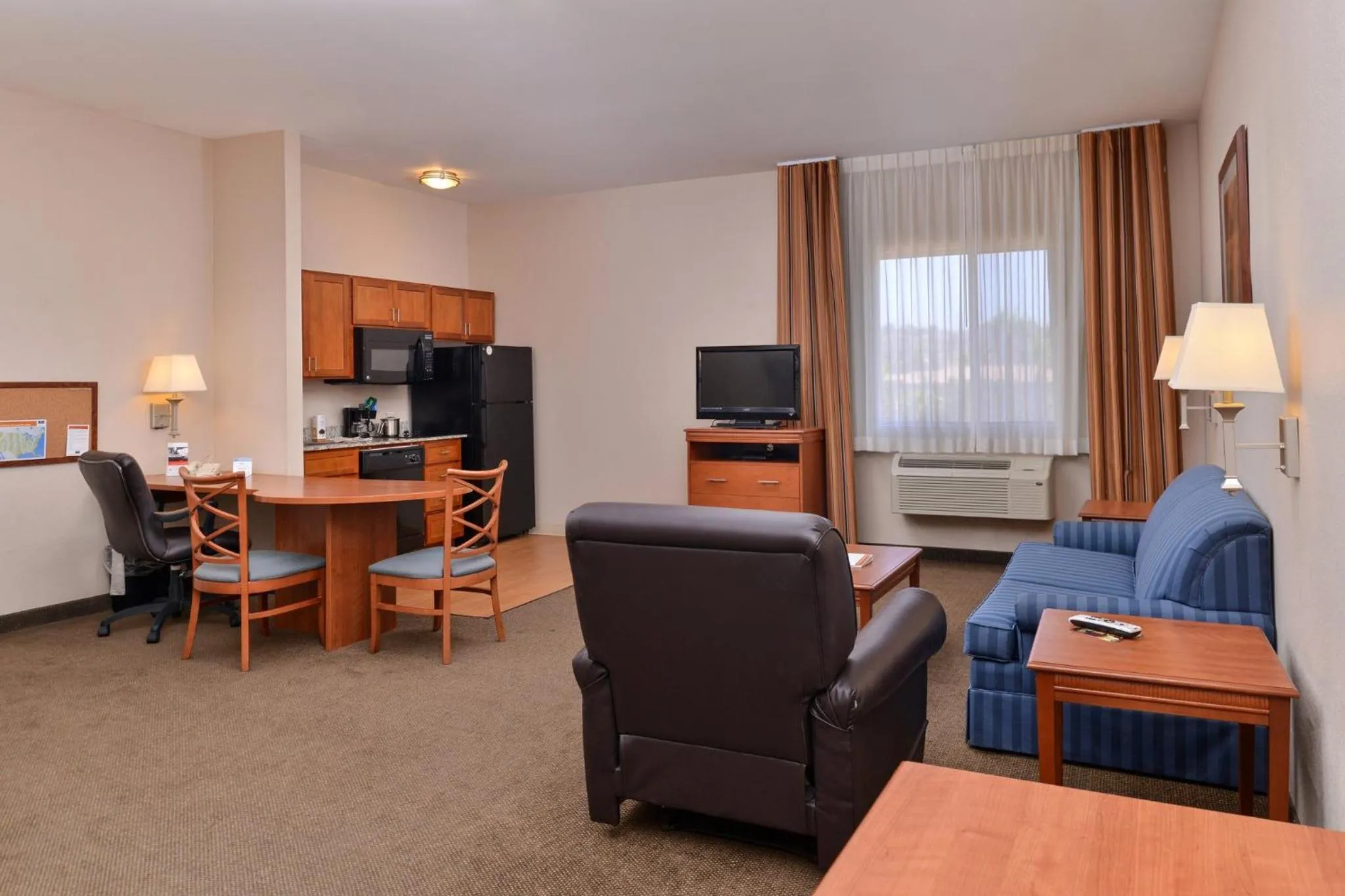 Bedroom in Candlewood Suites San Diego by IHG