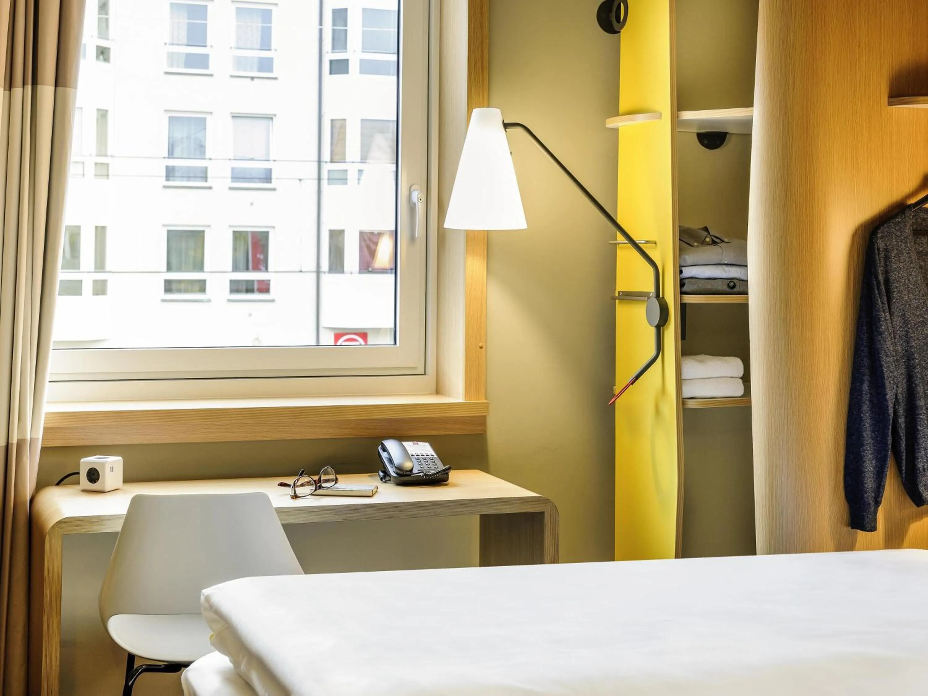 Bedroom in ibis Hotel Muenchen City West