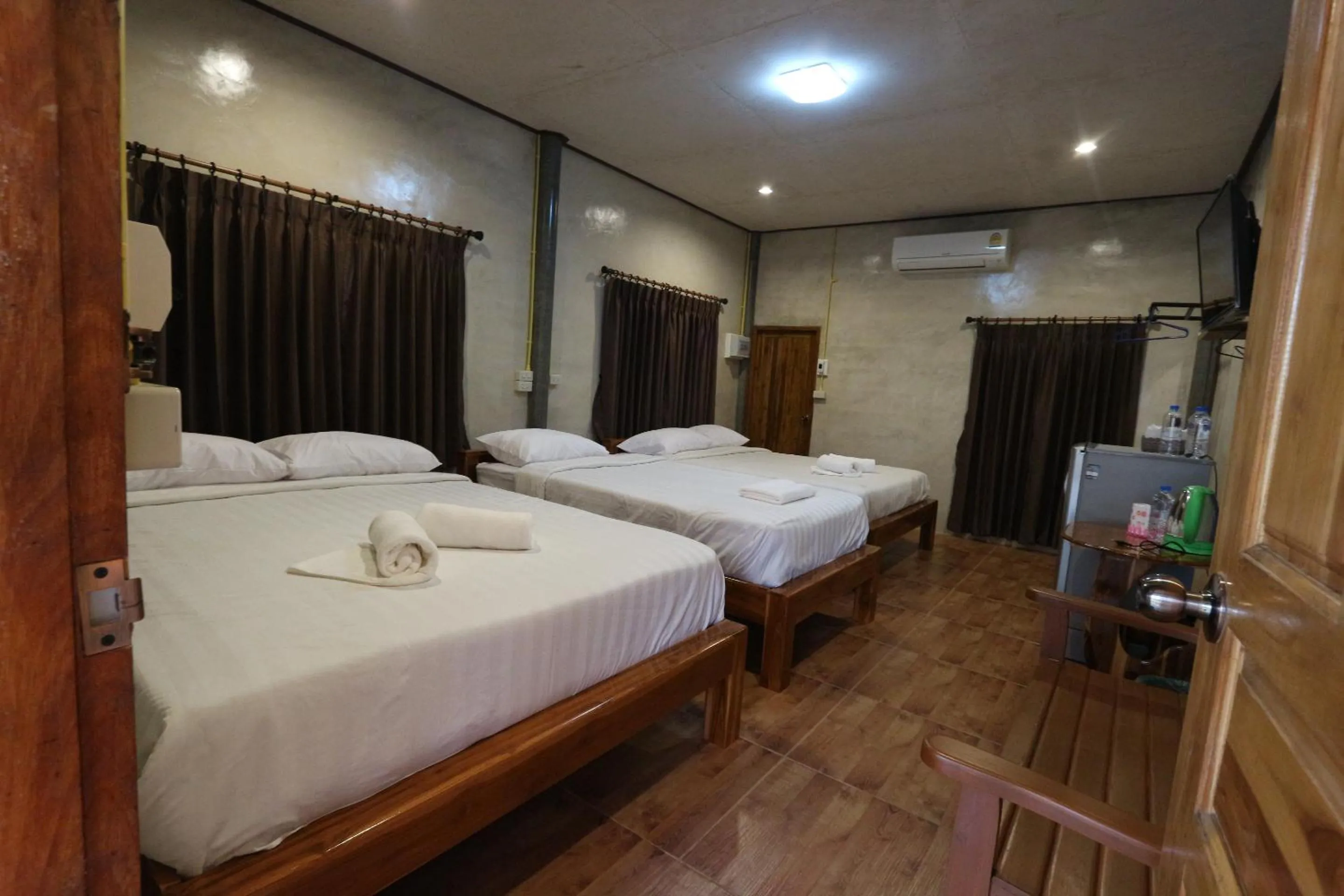 Bed in Baan Khue Wieng Resort