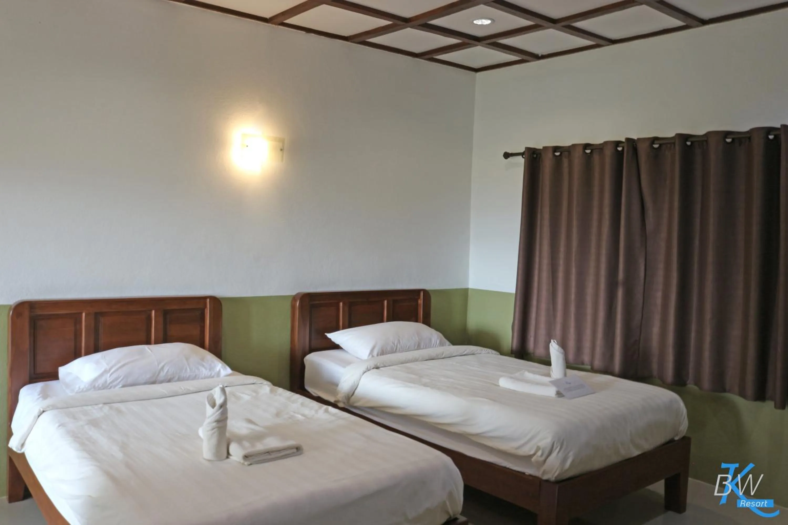 Bed in Baan Khue Wieng Resort