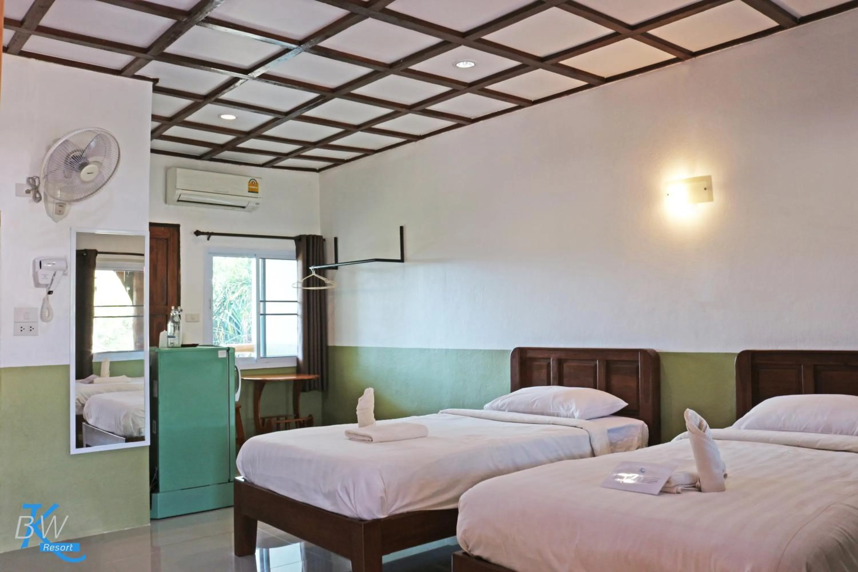 Bed in Baan Khue Wieng Resort