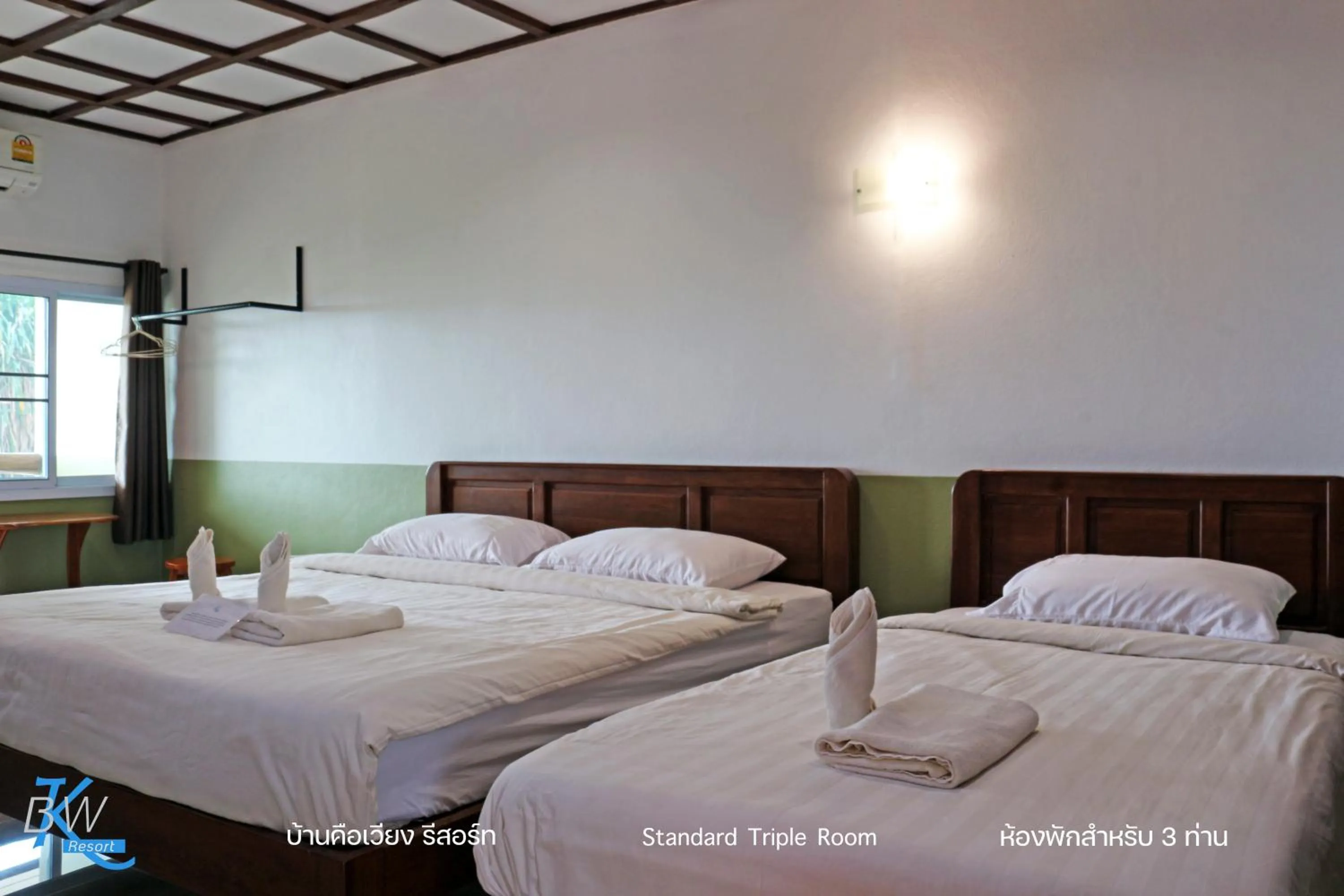 Bed in Baan Khue Wieng Resort