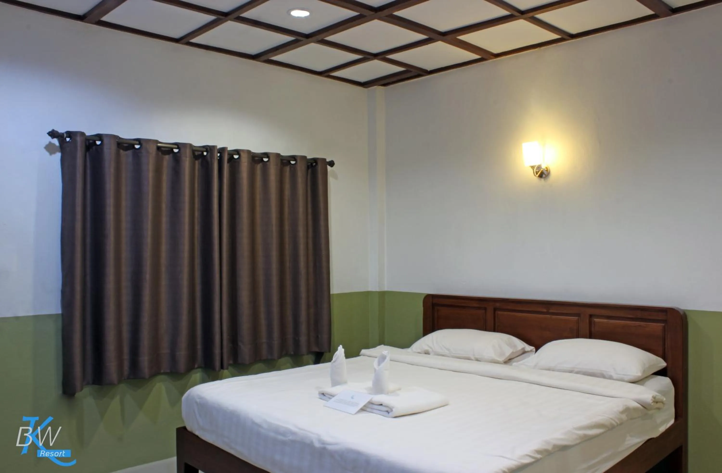 Bed in Baan Khue Wieng Resort