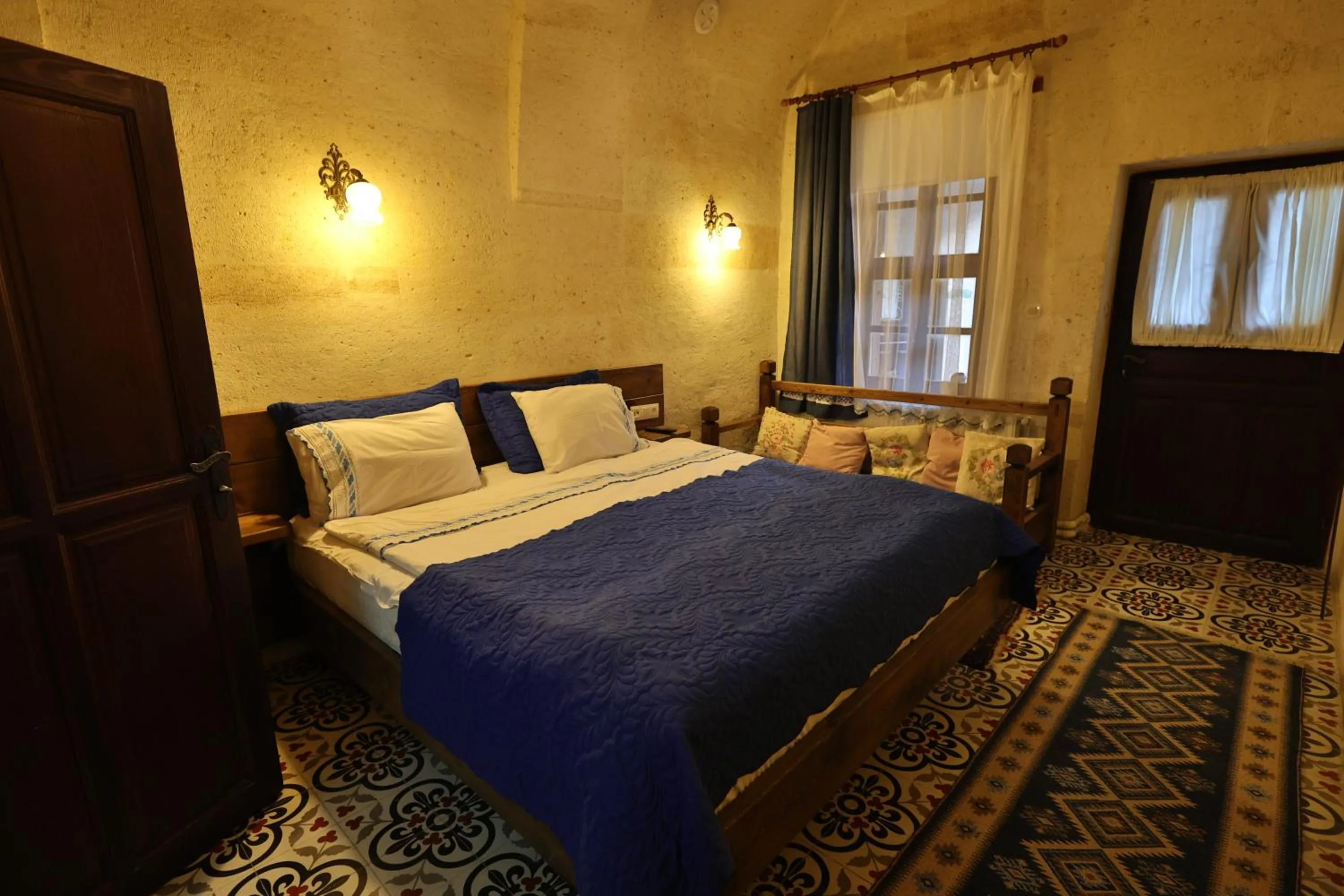 Photo of the whole room, Bed in Demisos Caves Hotel