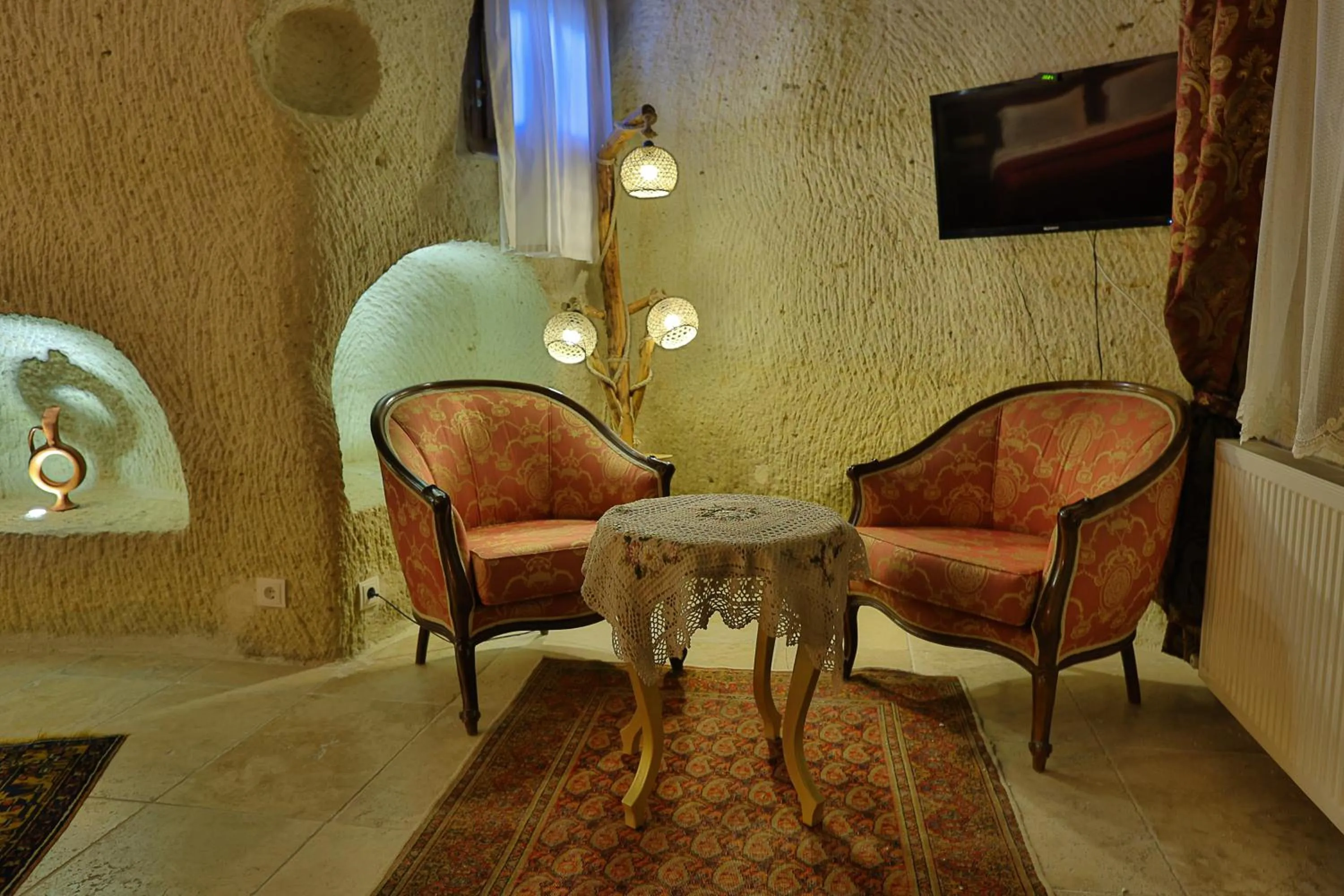 Photo of the whole room in Demisos Caves Hotel