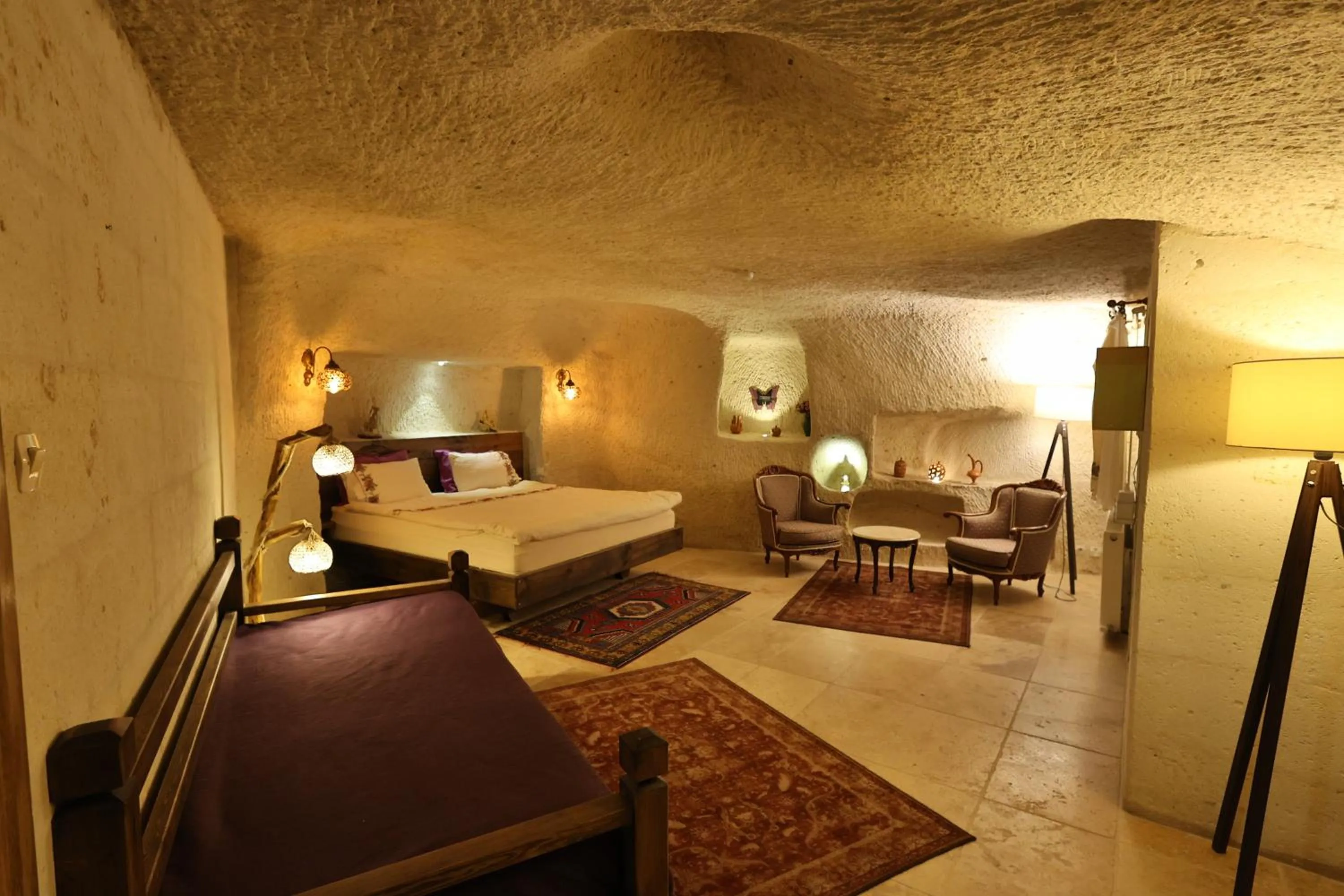 Photo of the whole room, Bed in Demisos Caves Hotel