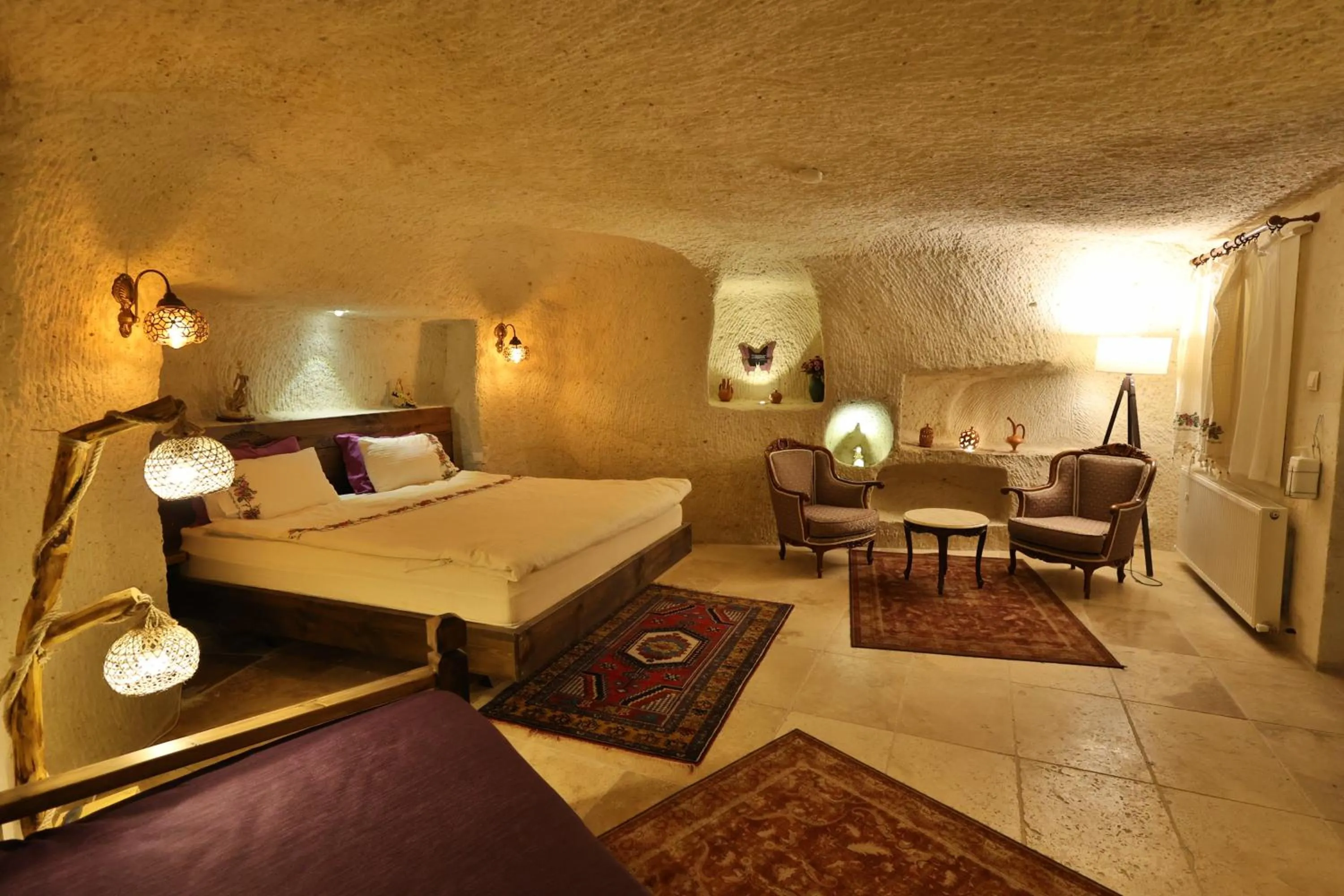 Photo of the whole room, Bed in Demisos Caves Hotel