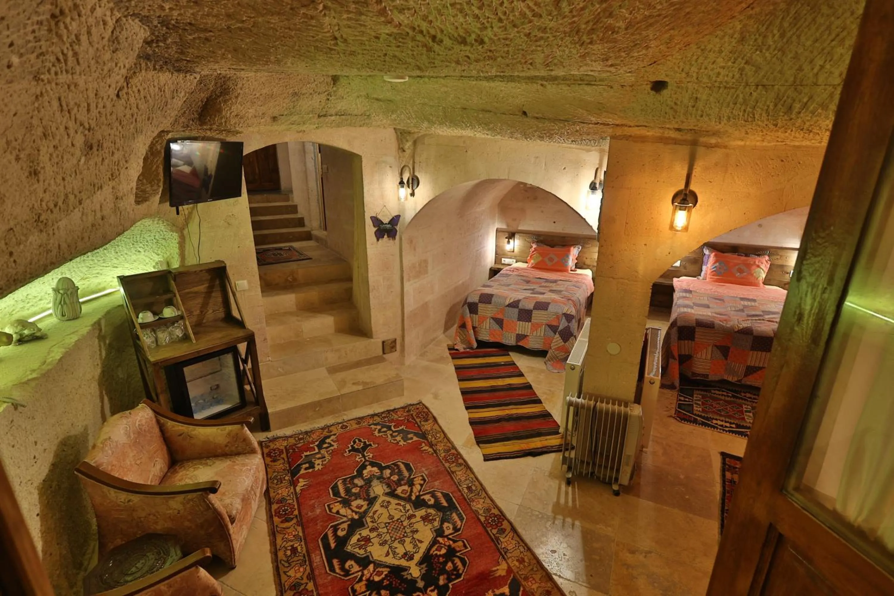 Photo of the whole room, Bed in Demisos Caves Hotel
