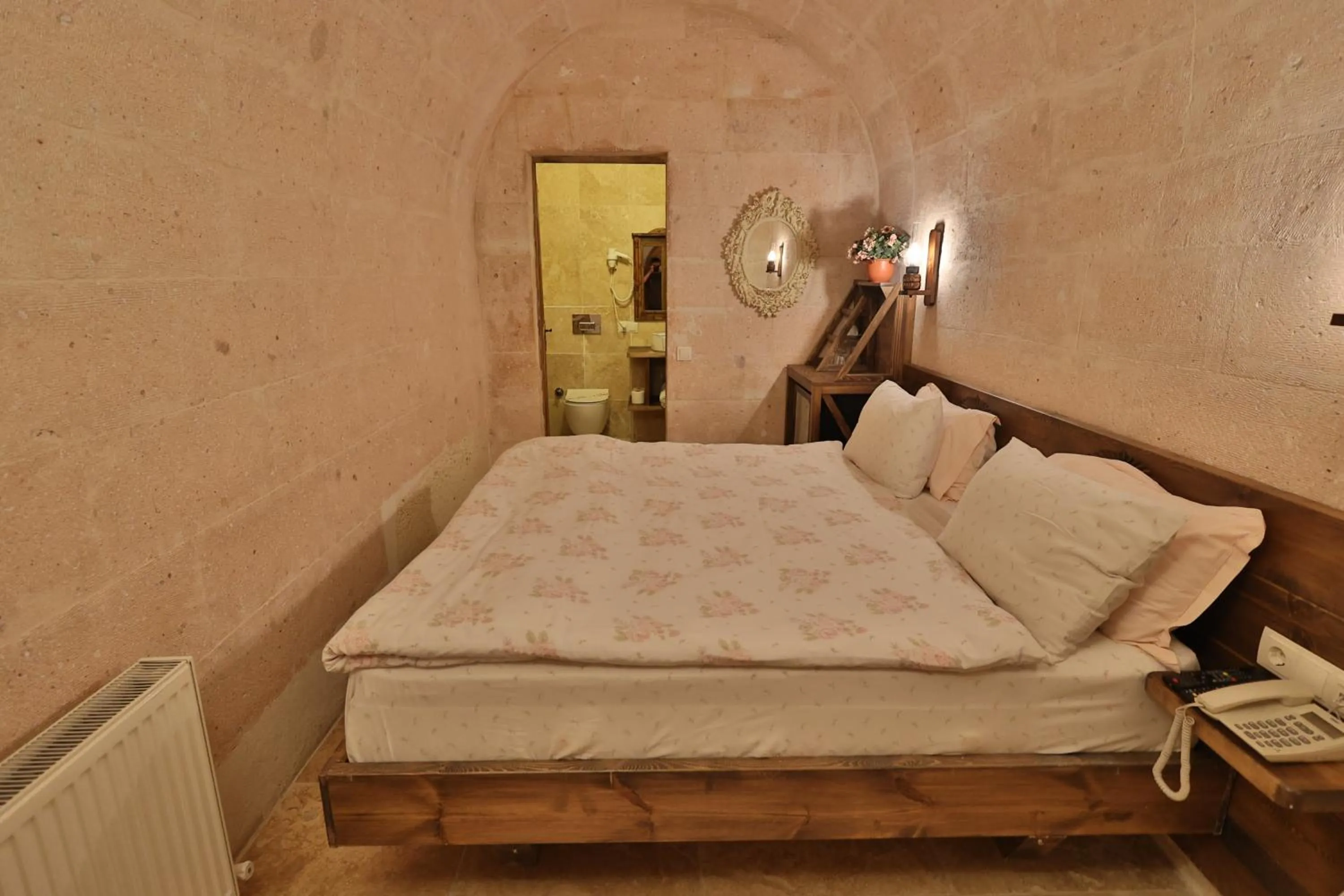 Photo of the whole room, Bed in Demisos Caves Hotel