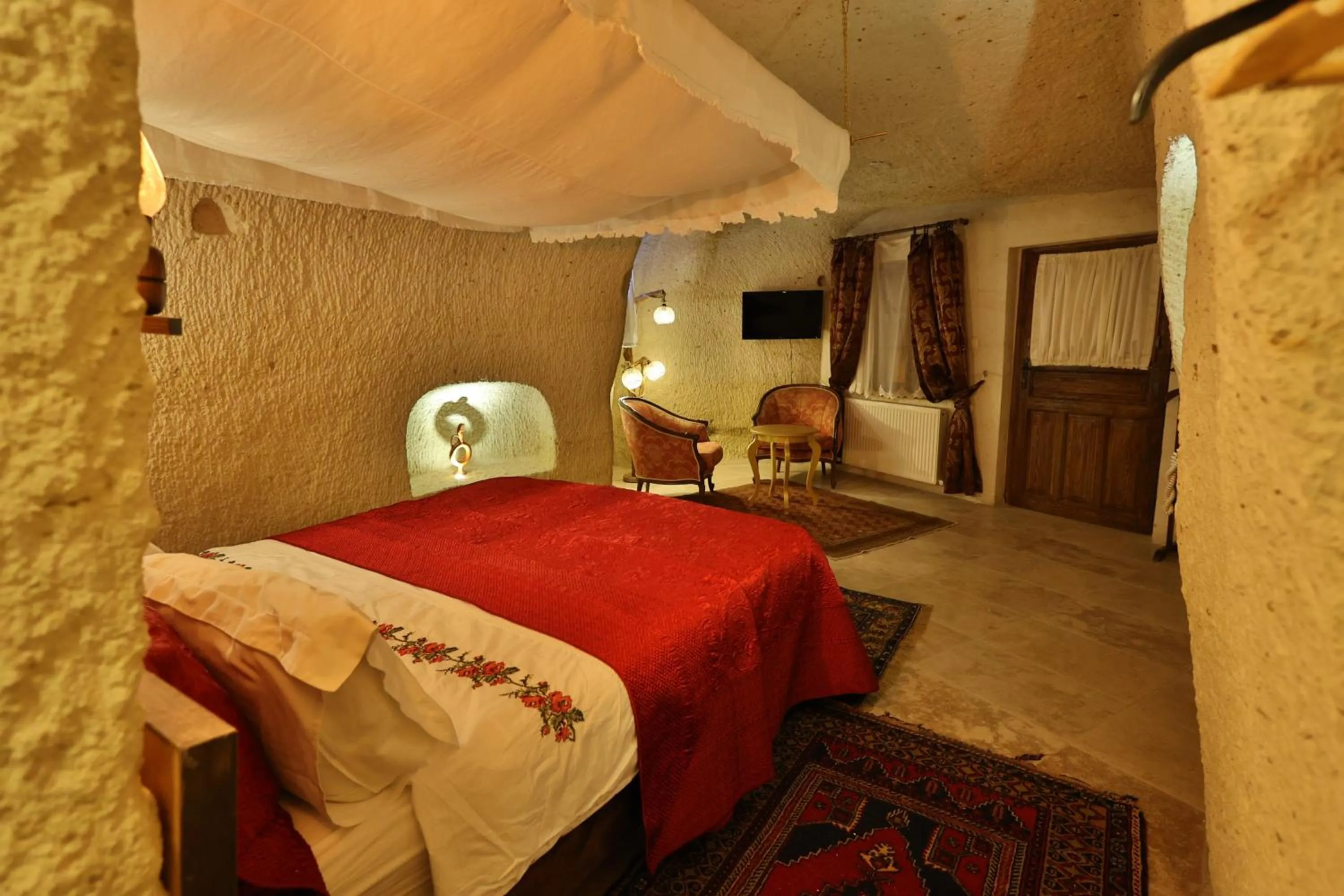 Photo of the whole room, Bed in Demisos Caves Hotel