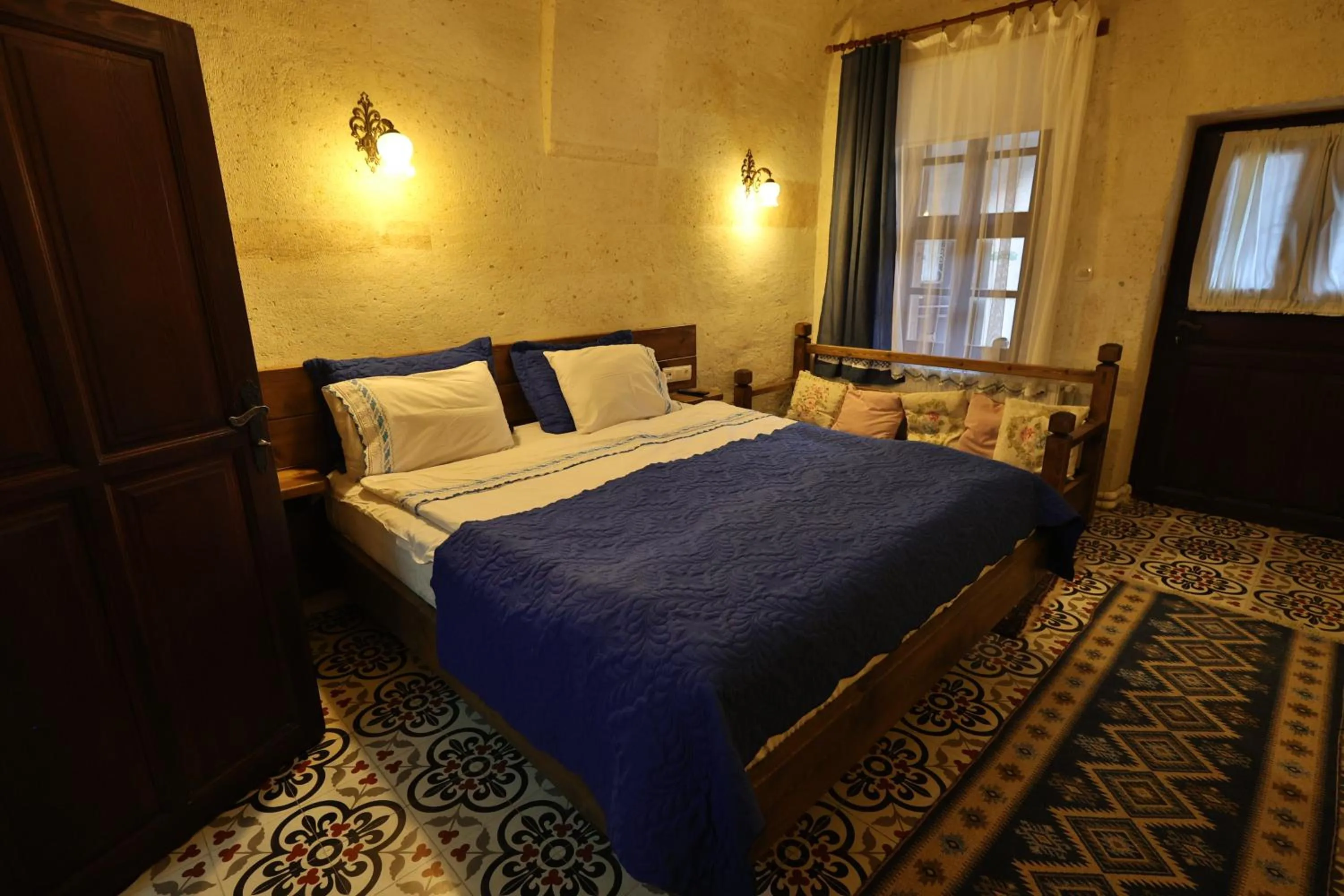 Photo of the whole room, Bed in Demisos Caves Hotel