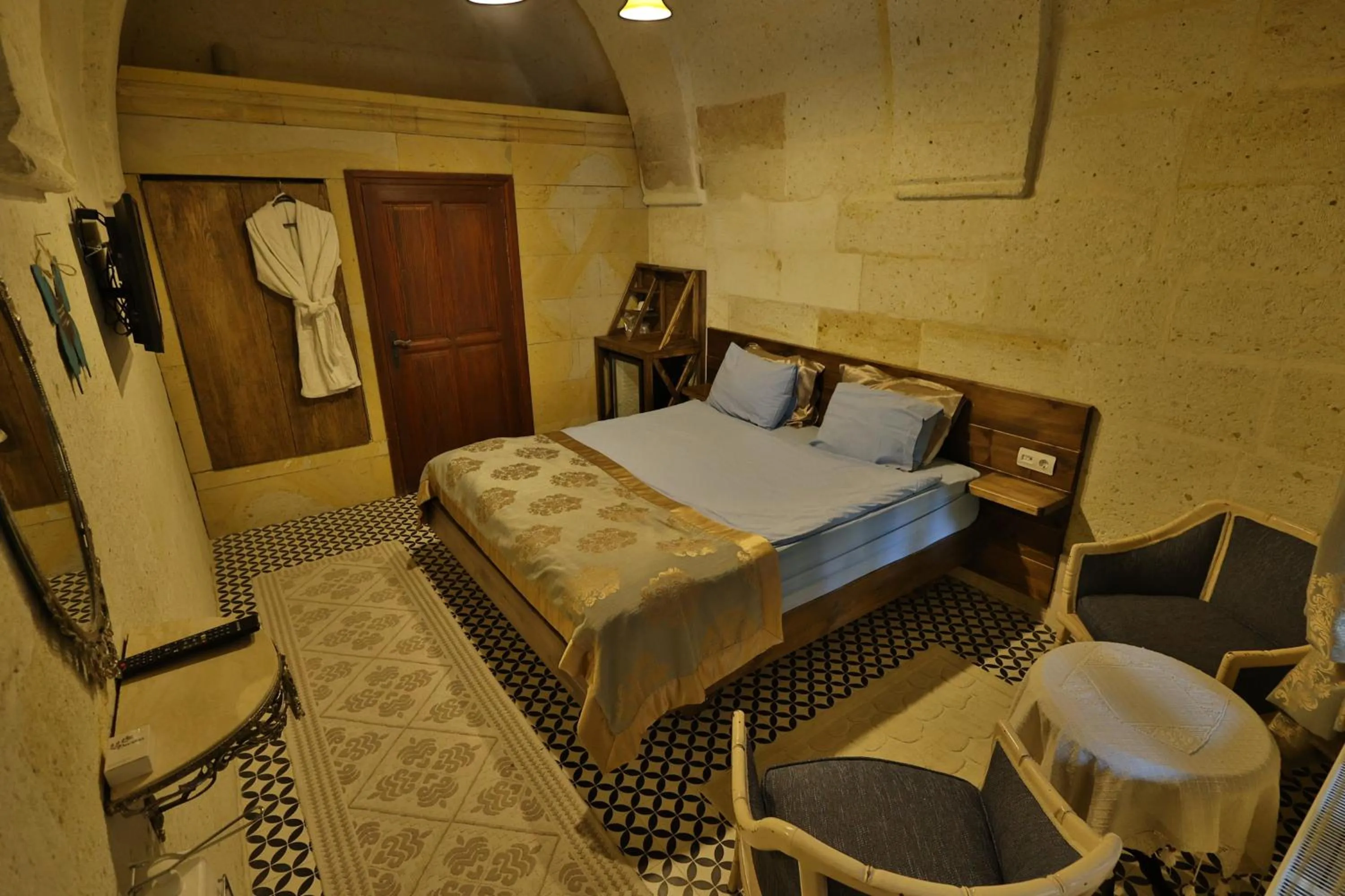 Photo of the whole room, Bed in Demisos Caves Hotel