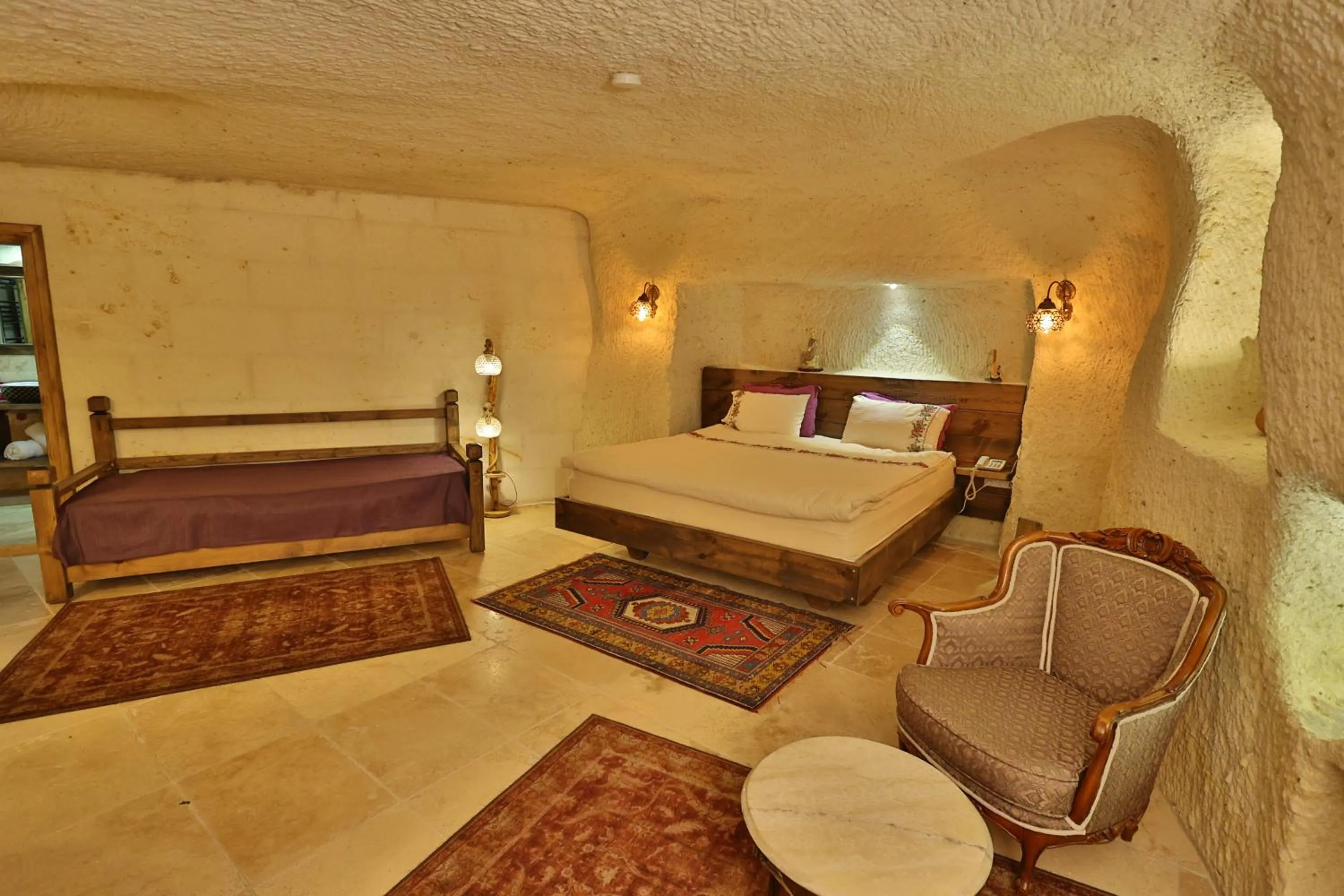 Photo of the whole room, Bed in Demisos Caves Hotel