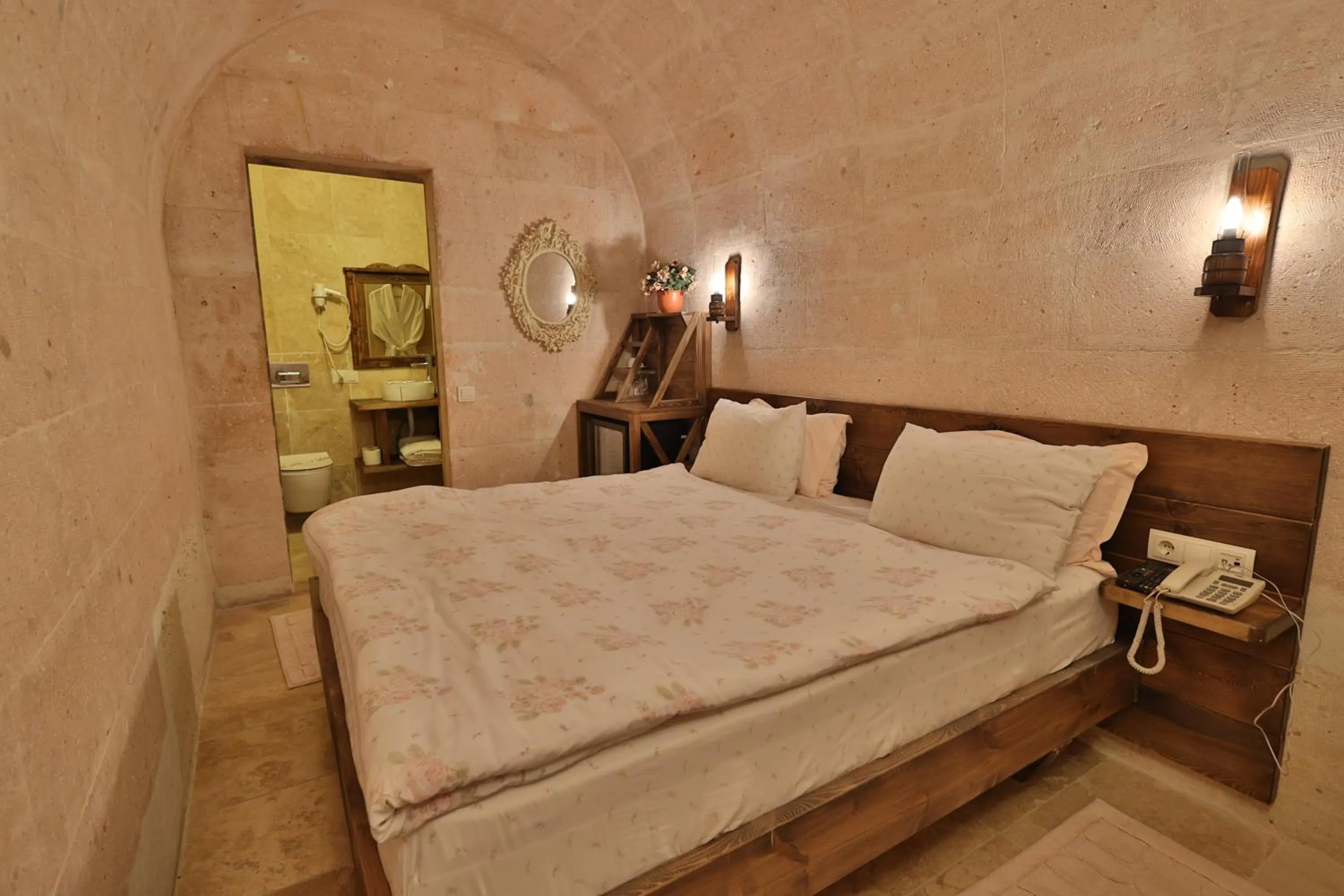 Photo of the whole room, Bed in Demisos Caves Hotel