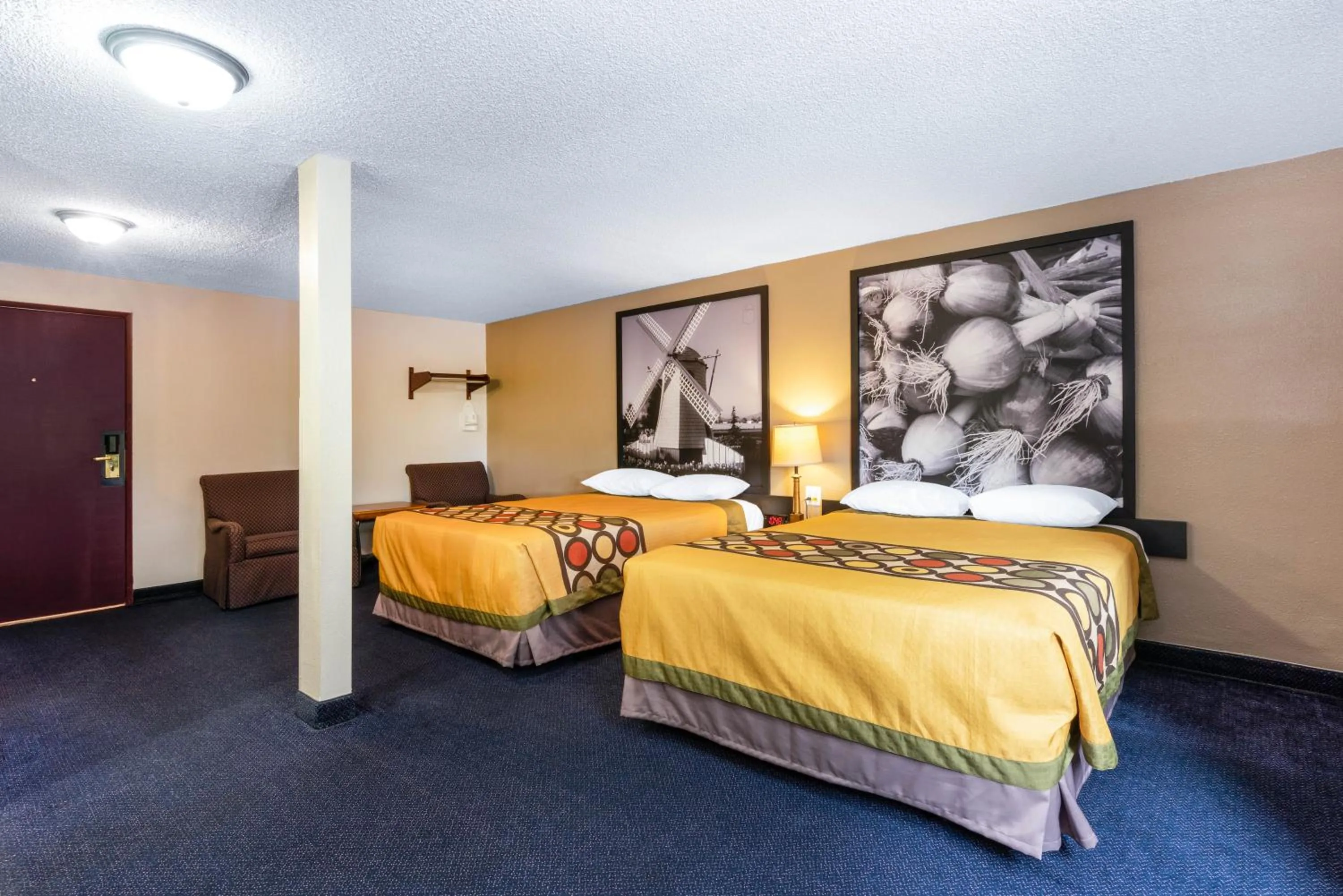 Bedroom, Bed in Sutton Suites Hotel