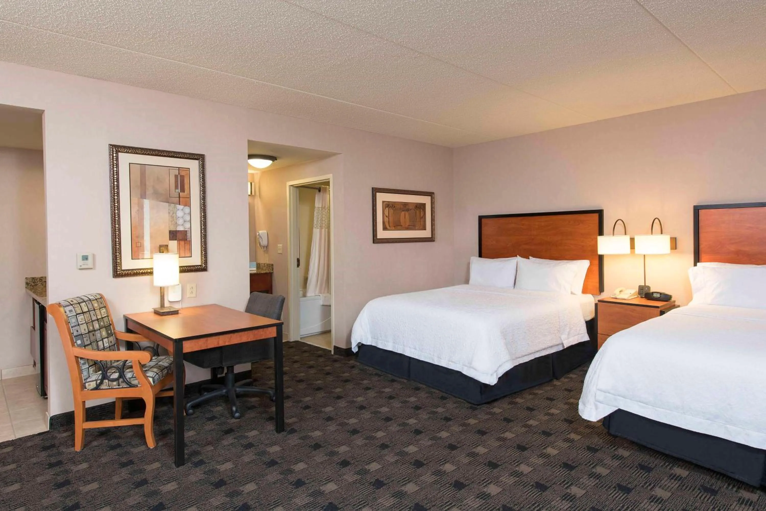 Bed in Hampton Inn and Suites Indianapolis-Fishers