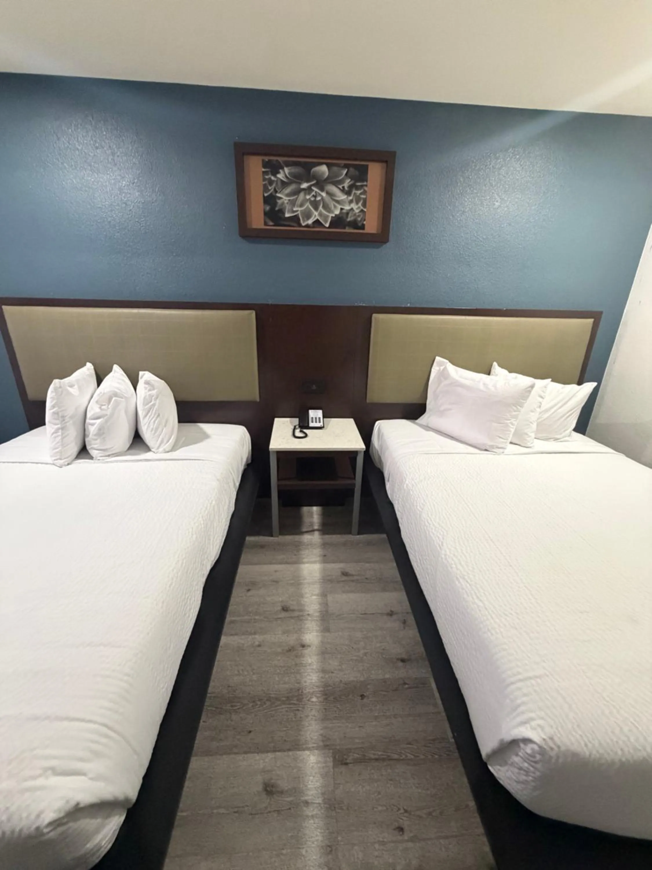 Bed in DTLV, a Baymont by Wyndham