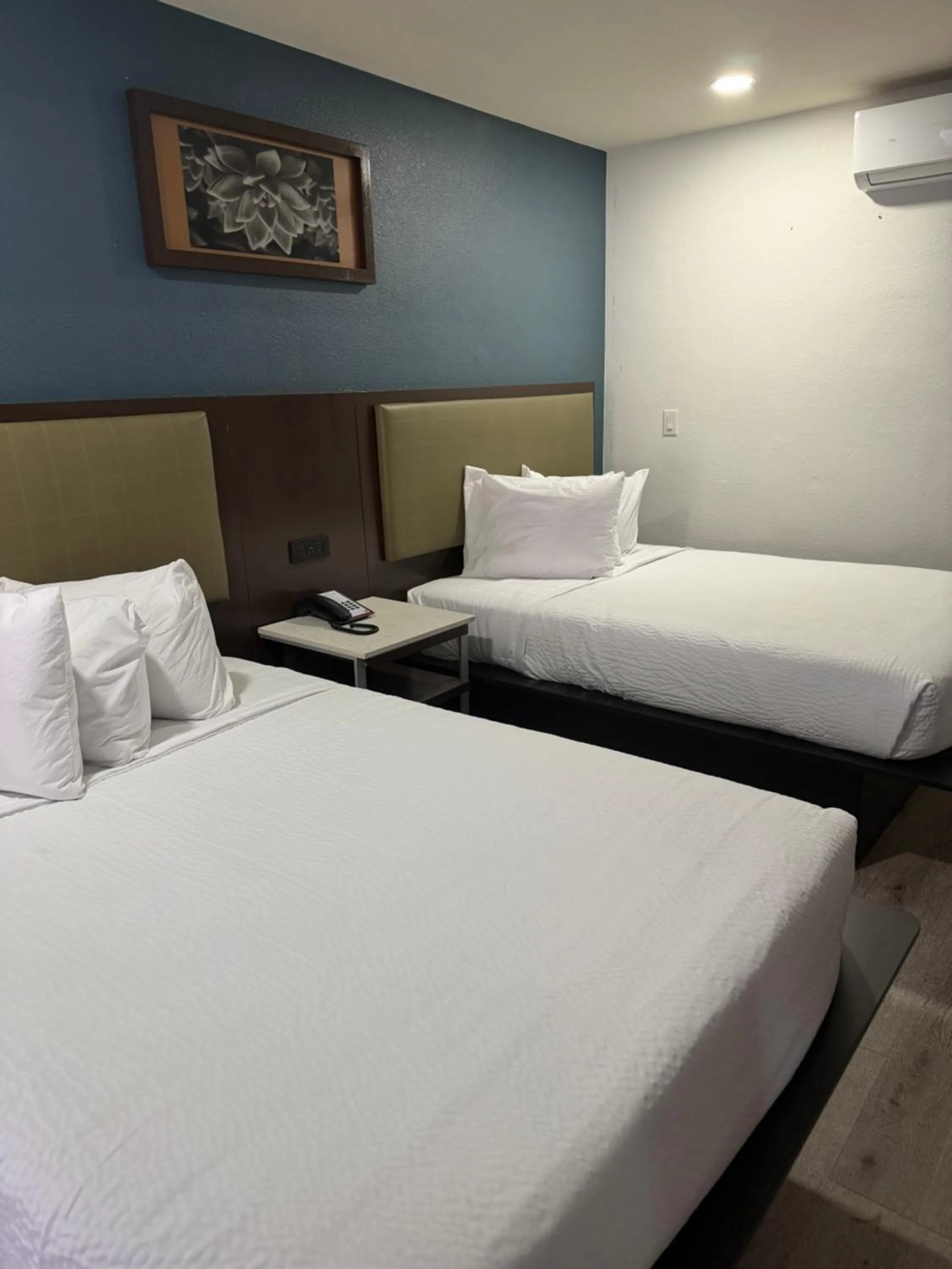 Bed in DTLV, a Baymont by Wyndham