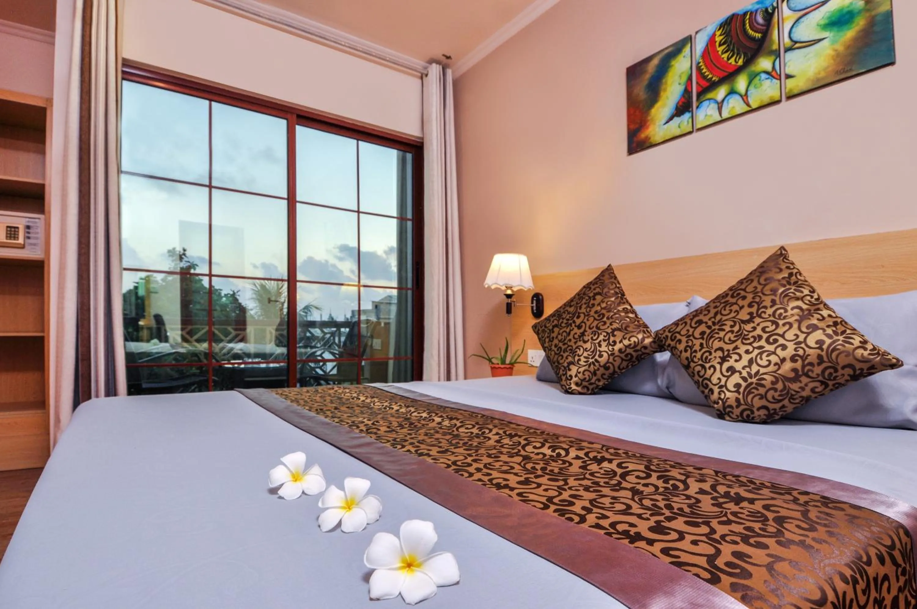 Bed in Triton Beach Hotel & Spa